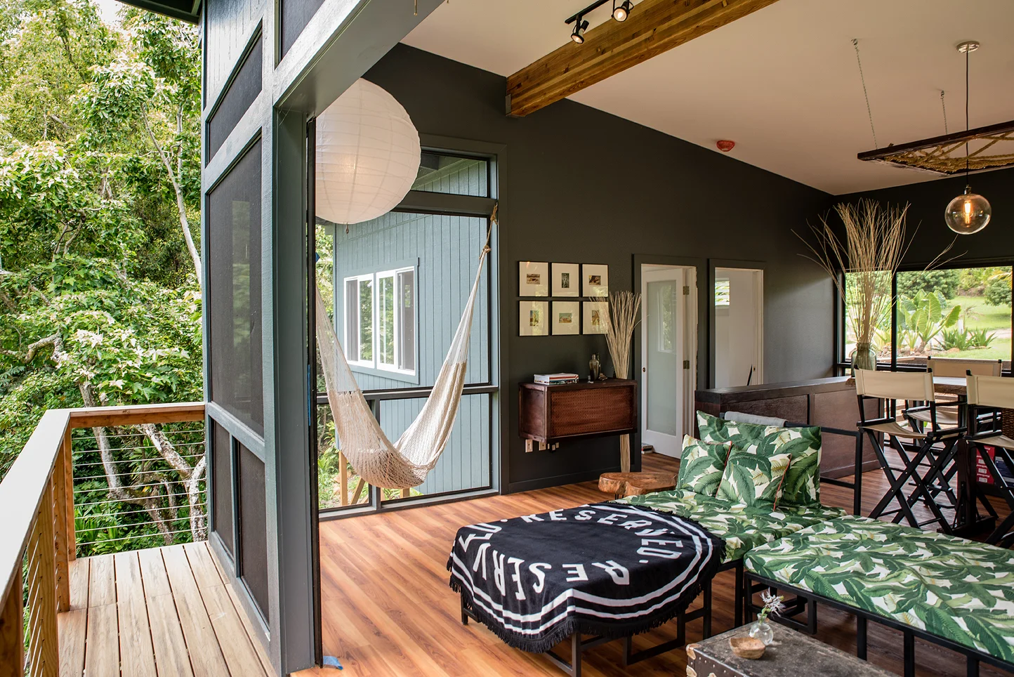 The back patio overlooks the property's private 20 foot waterfall. 