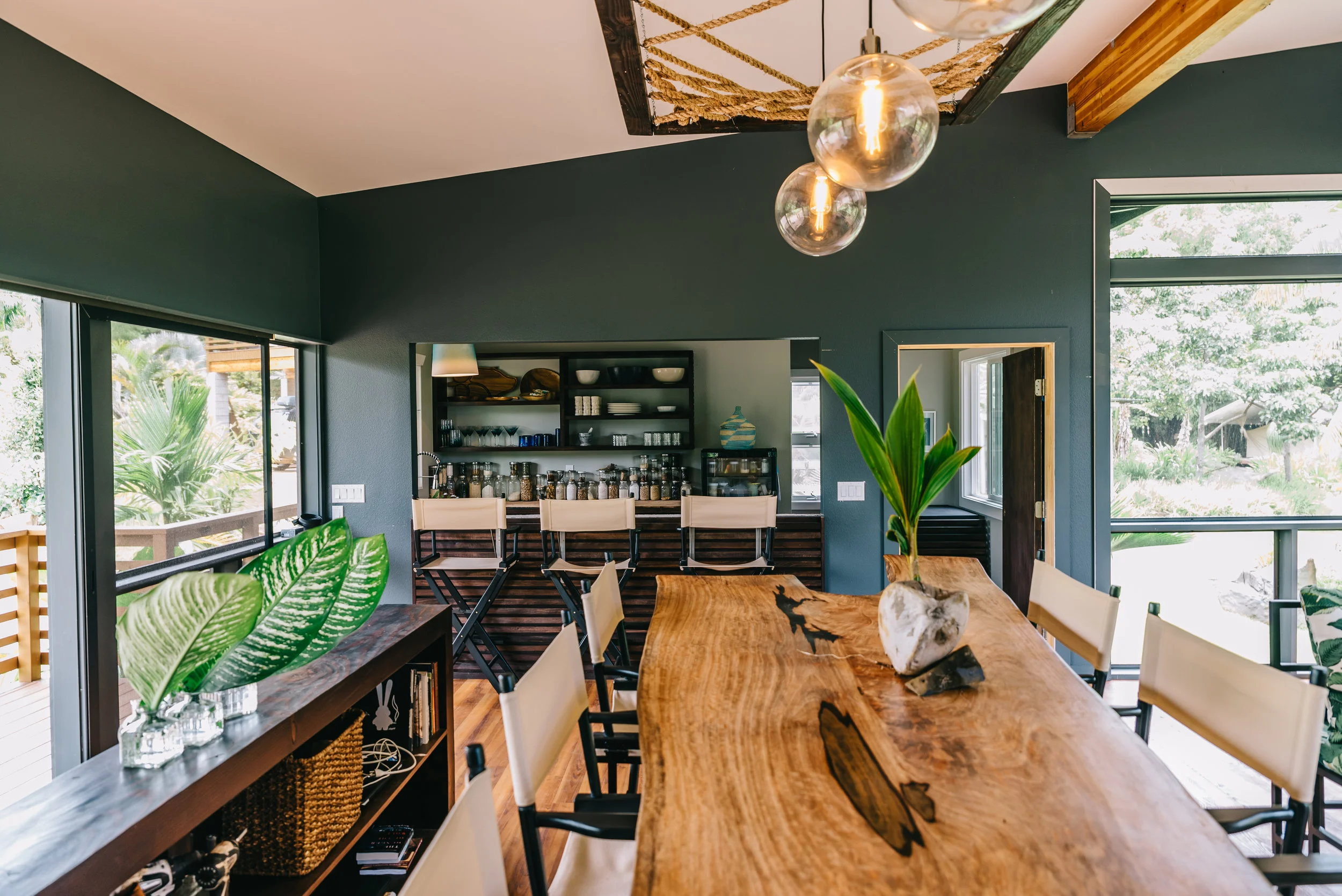 The mango slab for the dining area came from a neighboring farm. The raw slab was designed and finished by Brewer Design. 