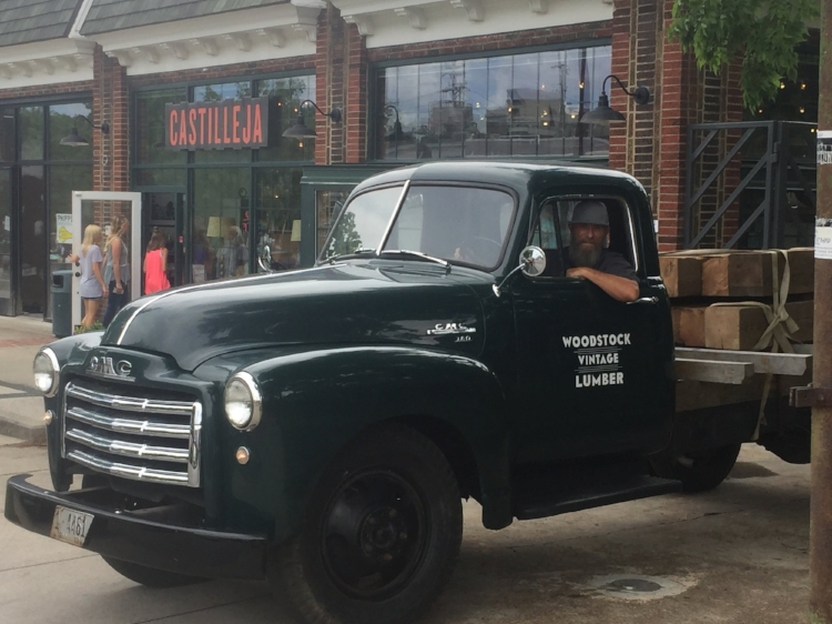 Woodstock owner, Brent, dropping off beams in our beloved Woodstock truck. (June 2017)