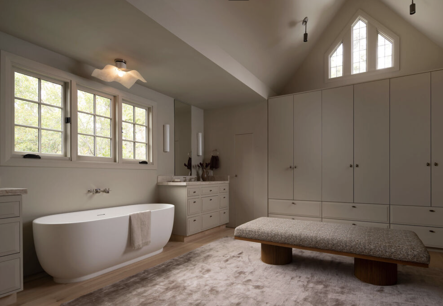 Primary bathroom with vaulted ceilings and soaking tub at 2027 Laughlin Park Drive Laughlin Park Los Feliz