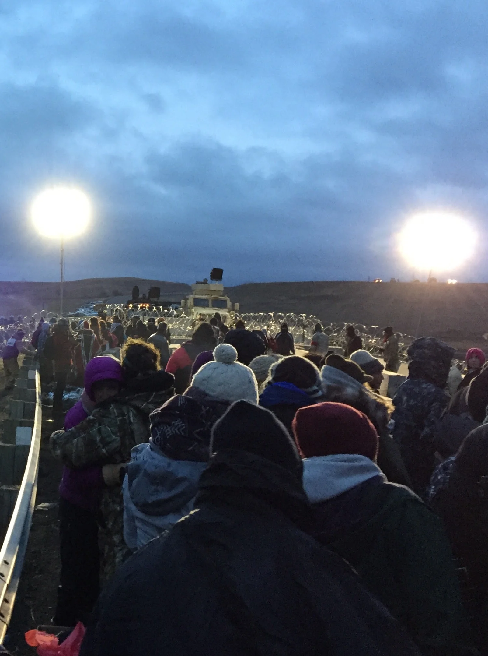 Women's silent march stopped on the bridge by the militarized police.