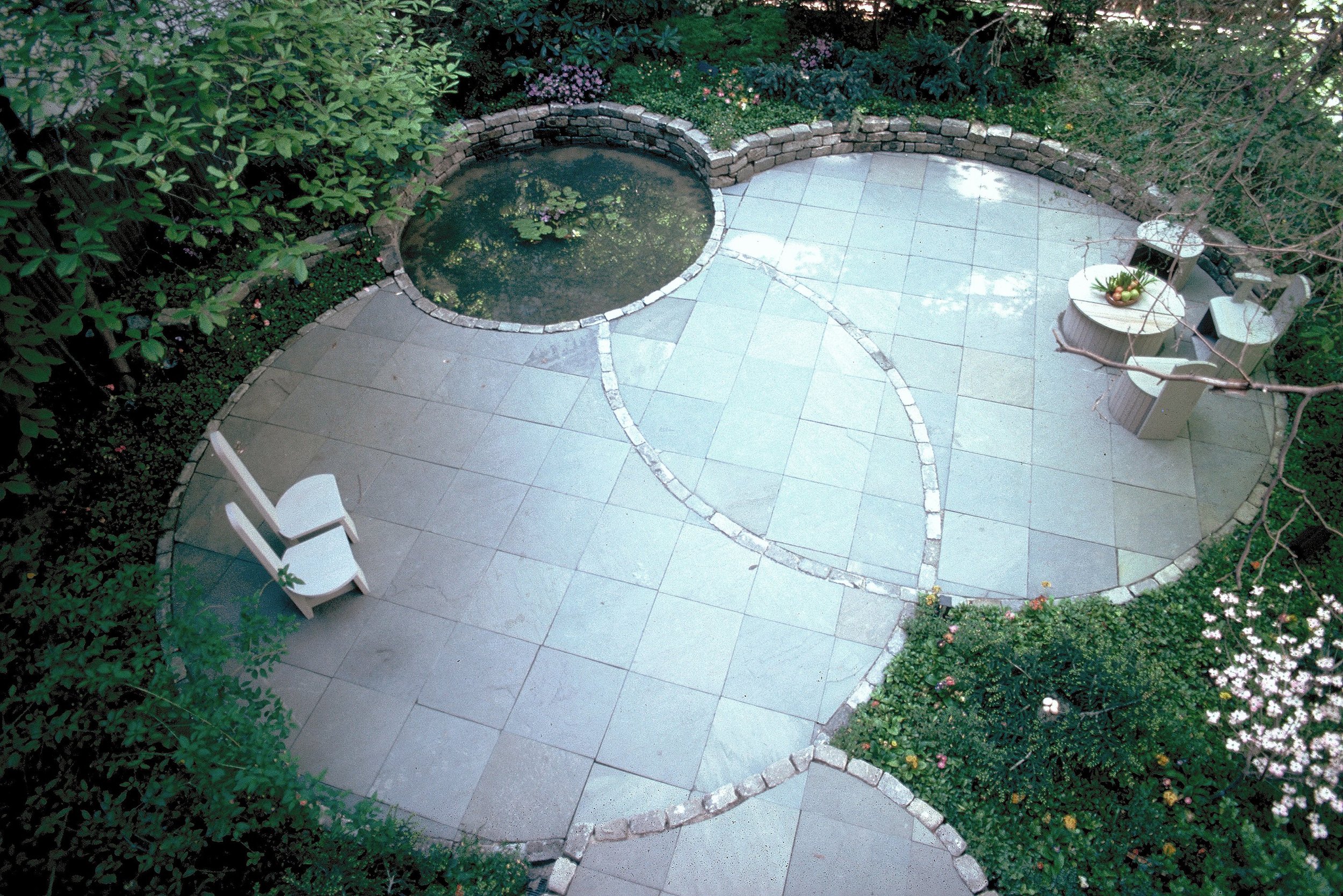 KB nyc townhouse luxury backyard garden design custom landscape architecture stonework seating installation maintenance.jpg