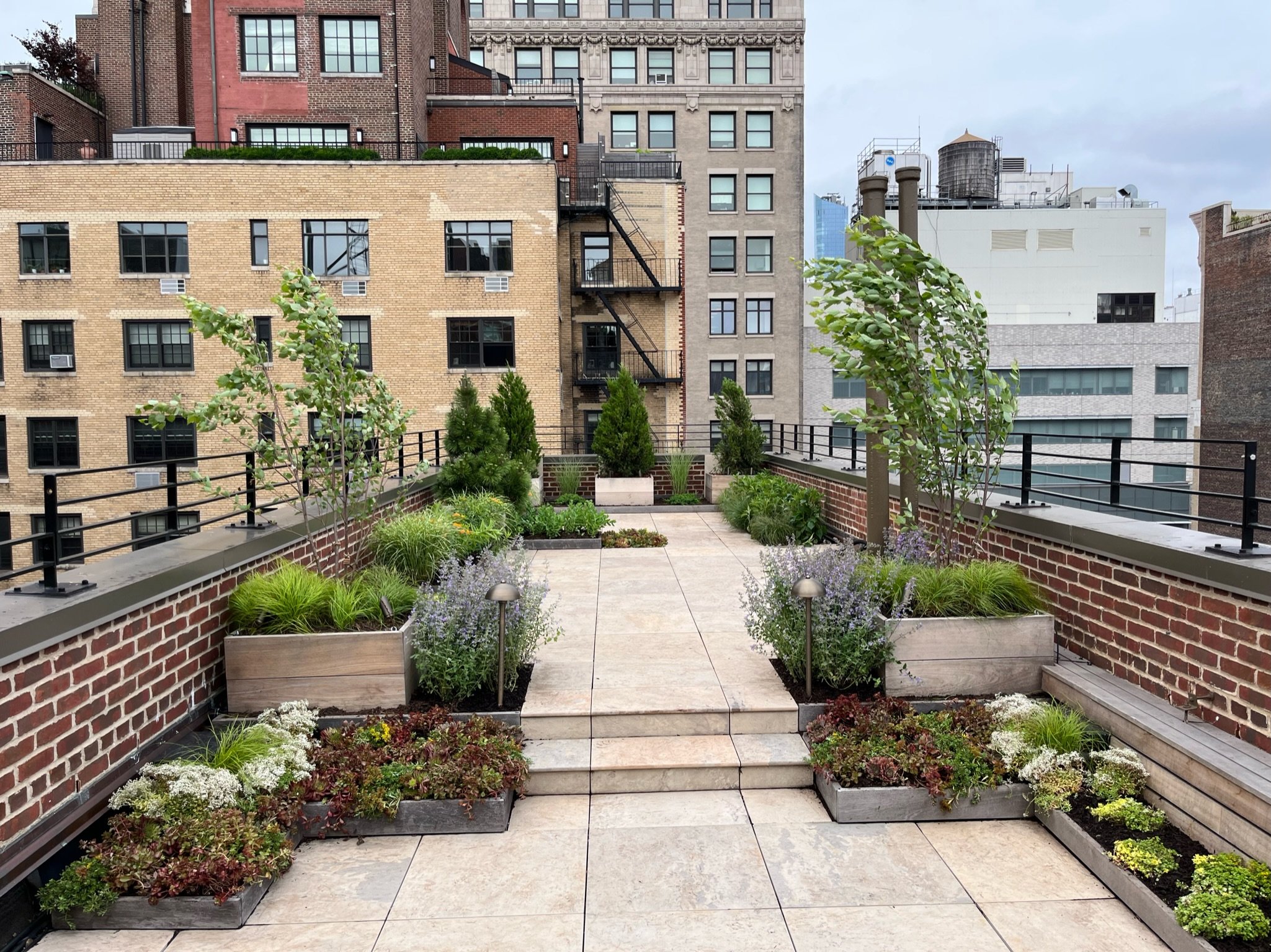 CSP nyc rooftop terrace garden luxury outdoor space high end custom planters paving installation maintenance.jpg