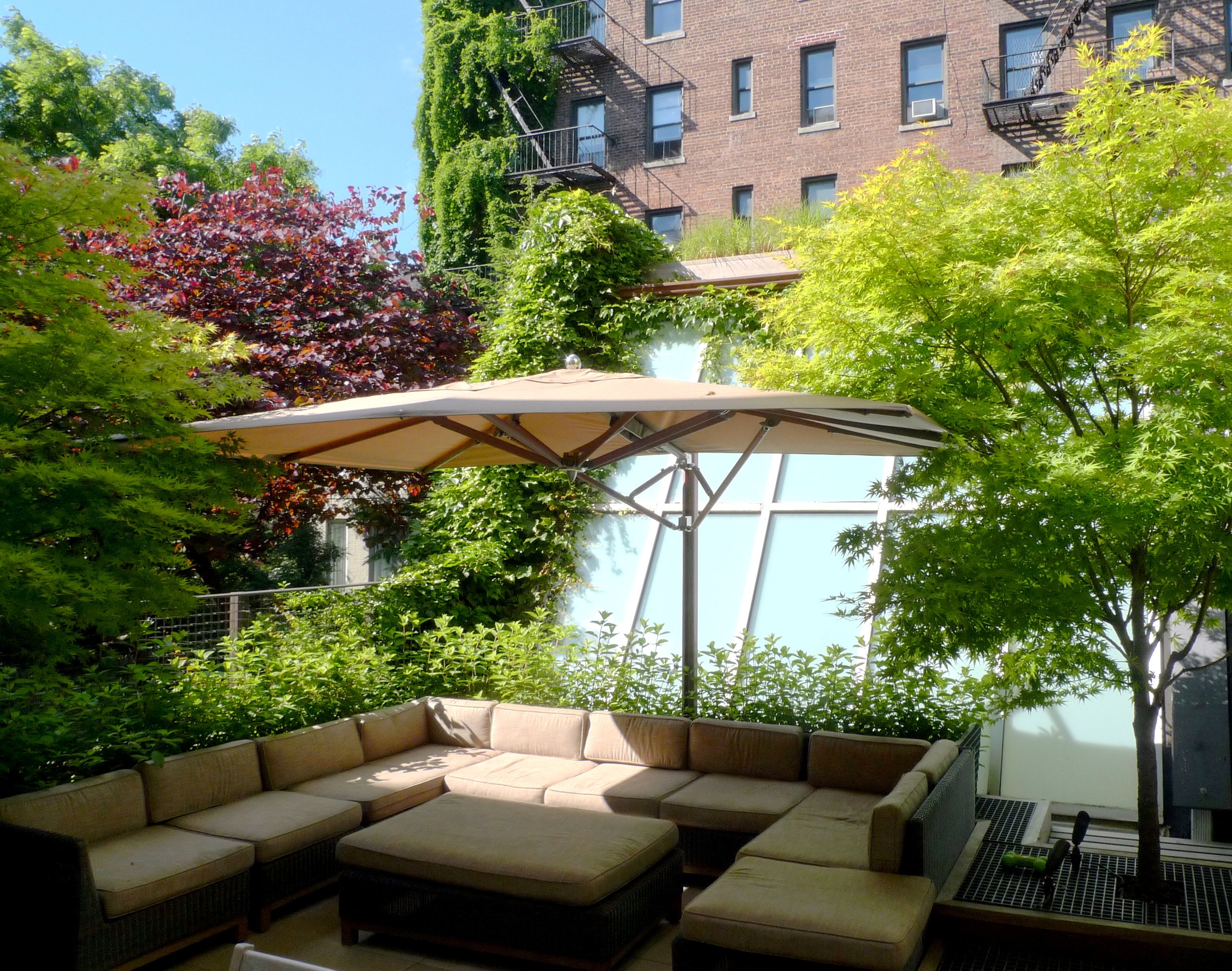 WB nyc rooftop terrace garden design outdoor space seating shade structure installation horticulture maintenance.jpg