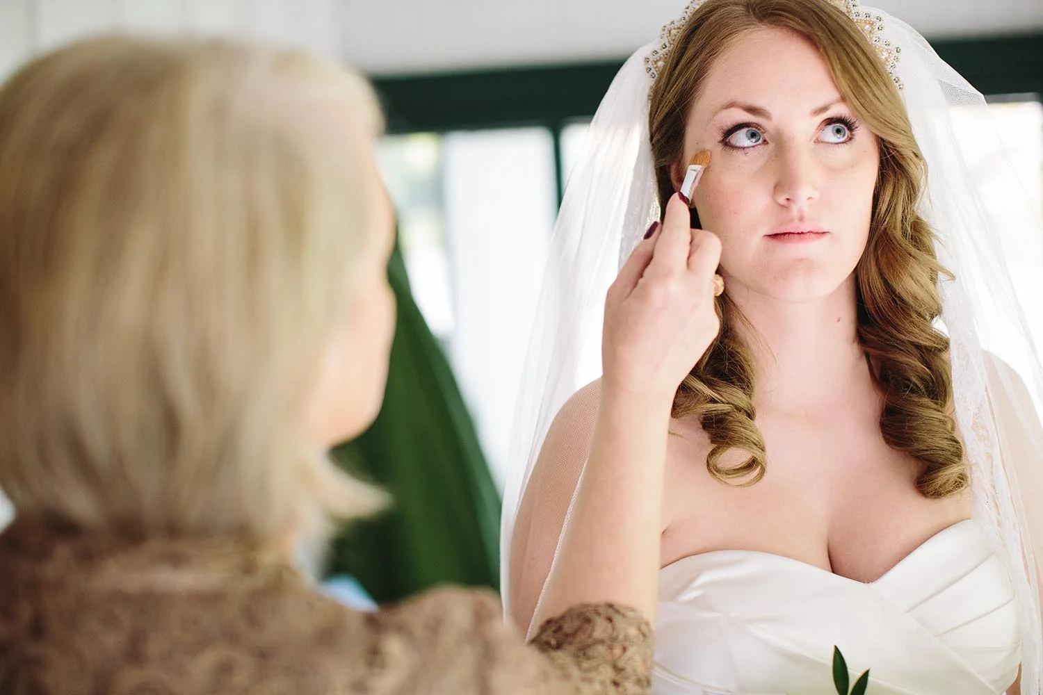 bride getting makeup done northern michigan