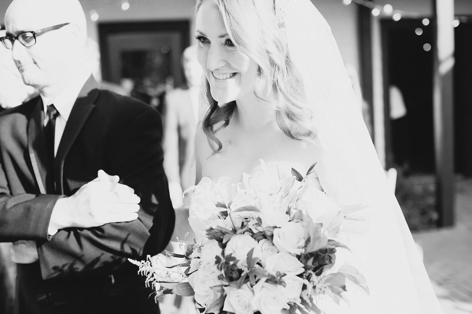 radiant bride walking down the aisle