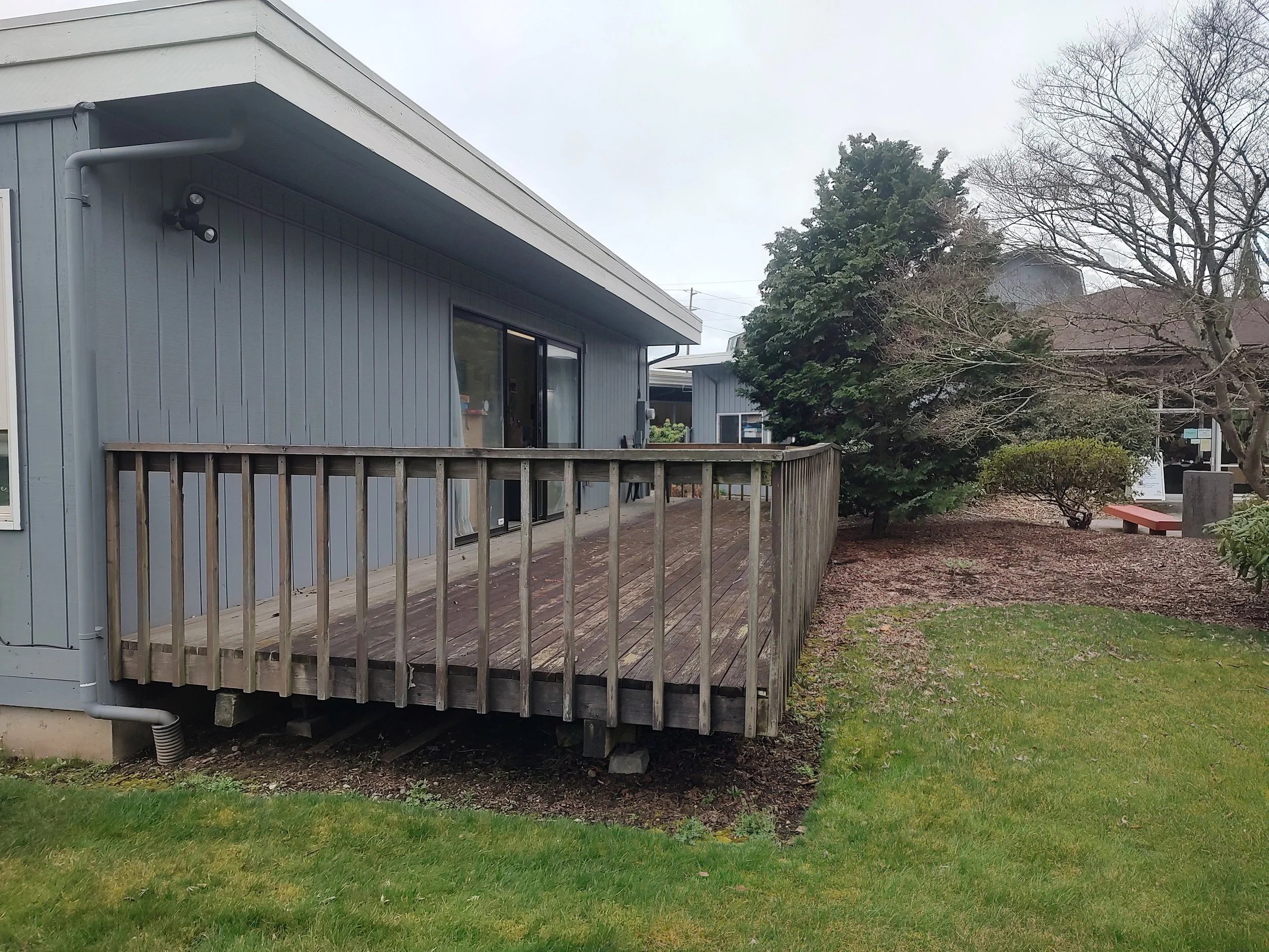 The original Supervised Visitation deck, which was unsafe for use due to rotten boards and exposed nails