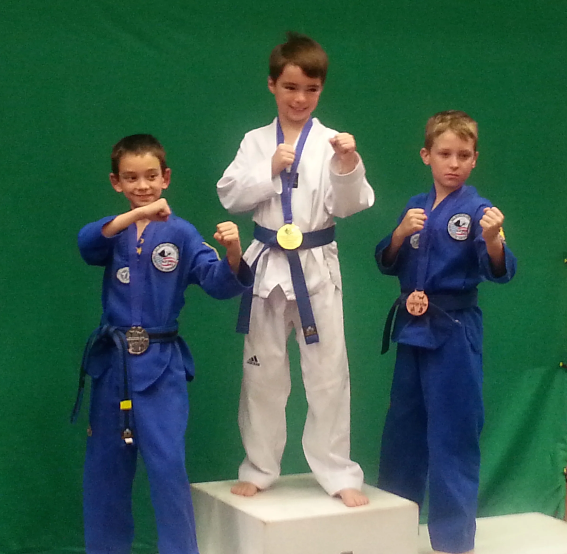 Ryan on the podium receiving his gold medal