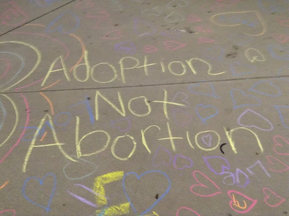 Killing ain't no option. Give mother's a real option -- adoption!