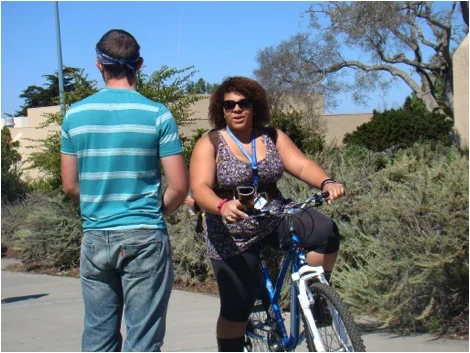 Young woman saved by a sign depicting a preborn victim of abortion. Bobby listens as she repeats her story.