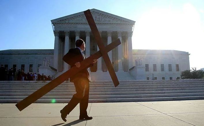 Don't get into a "Name That Tune" contest with Rev. Patrick Mahoney