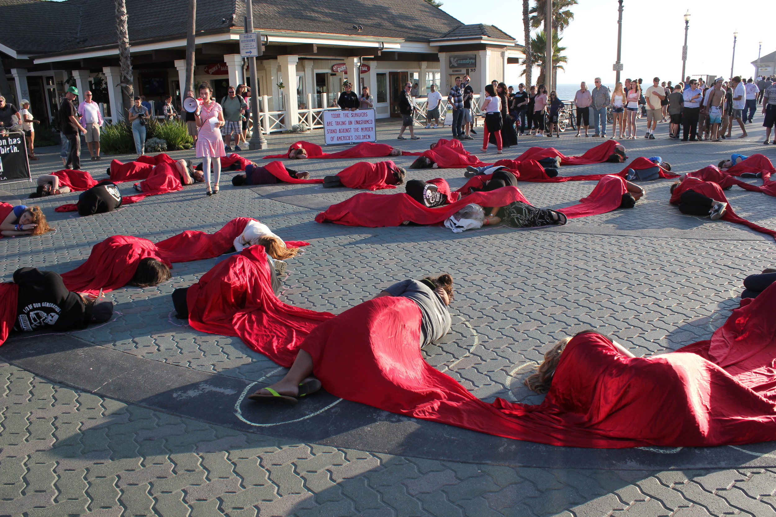 Million-to-one memorial die-in at Huntington Beach