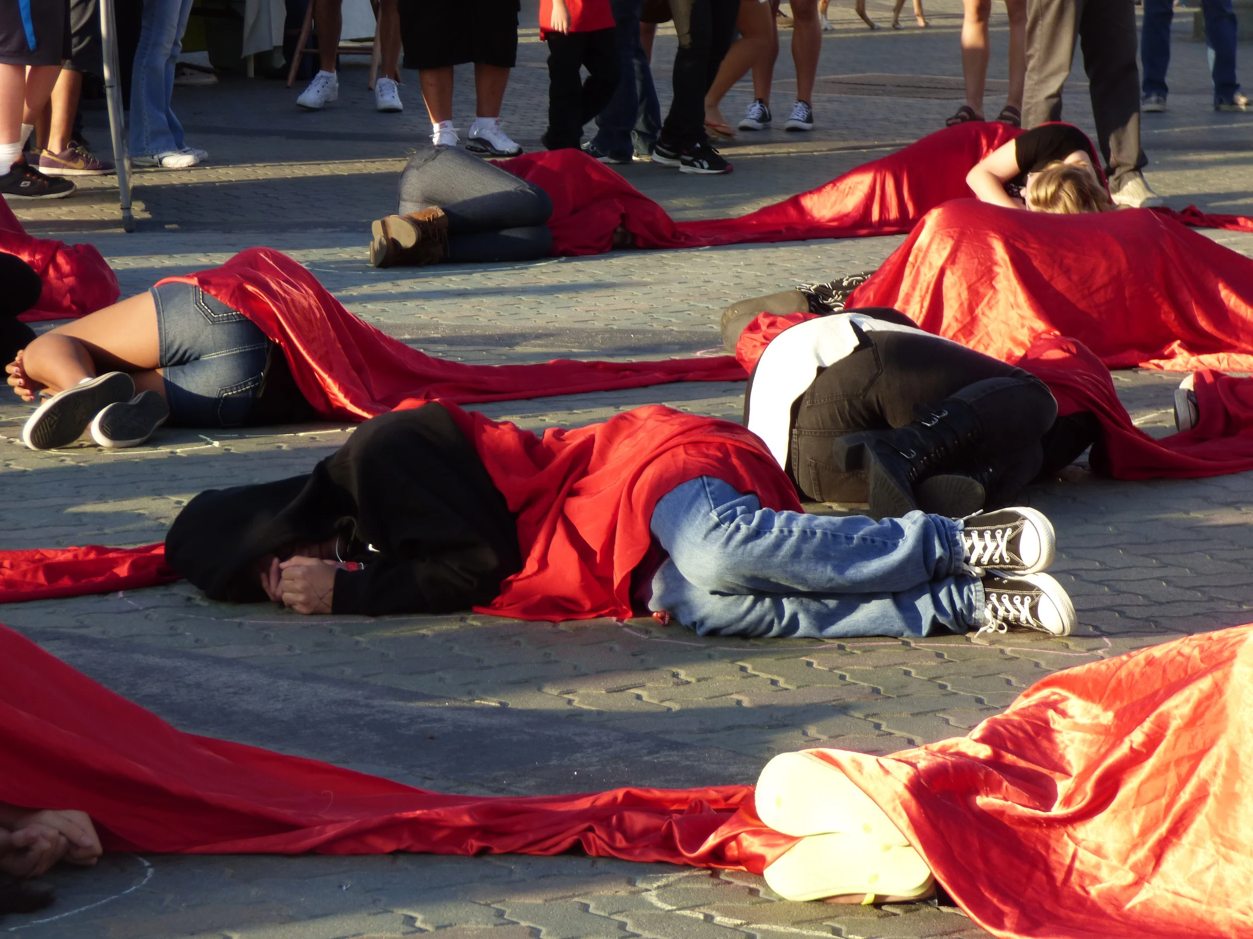 Million-to-one memorial die-in at Huntington Beach