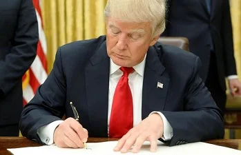 Trump signing 3.jpg