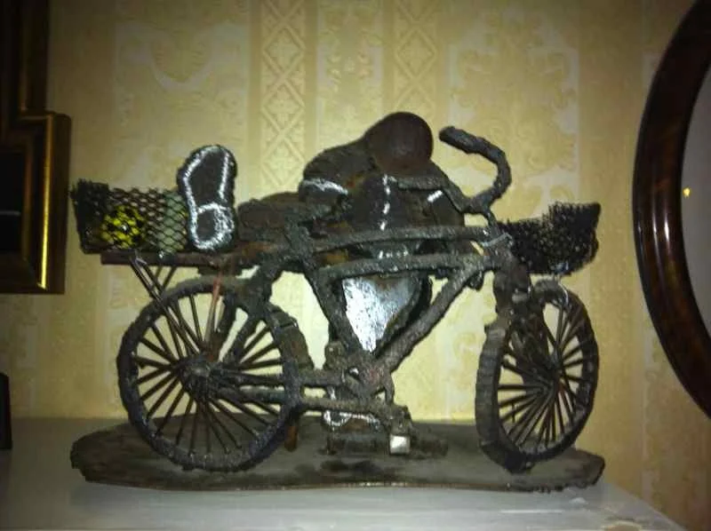 Boy Mounts Bike