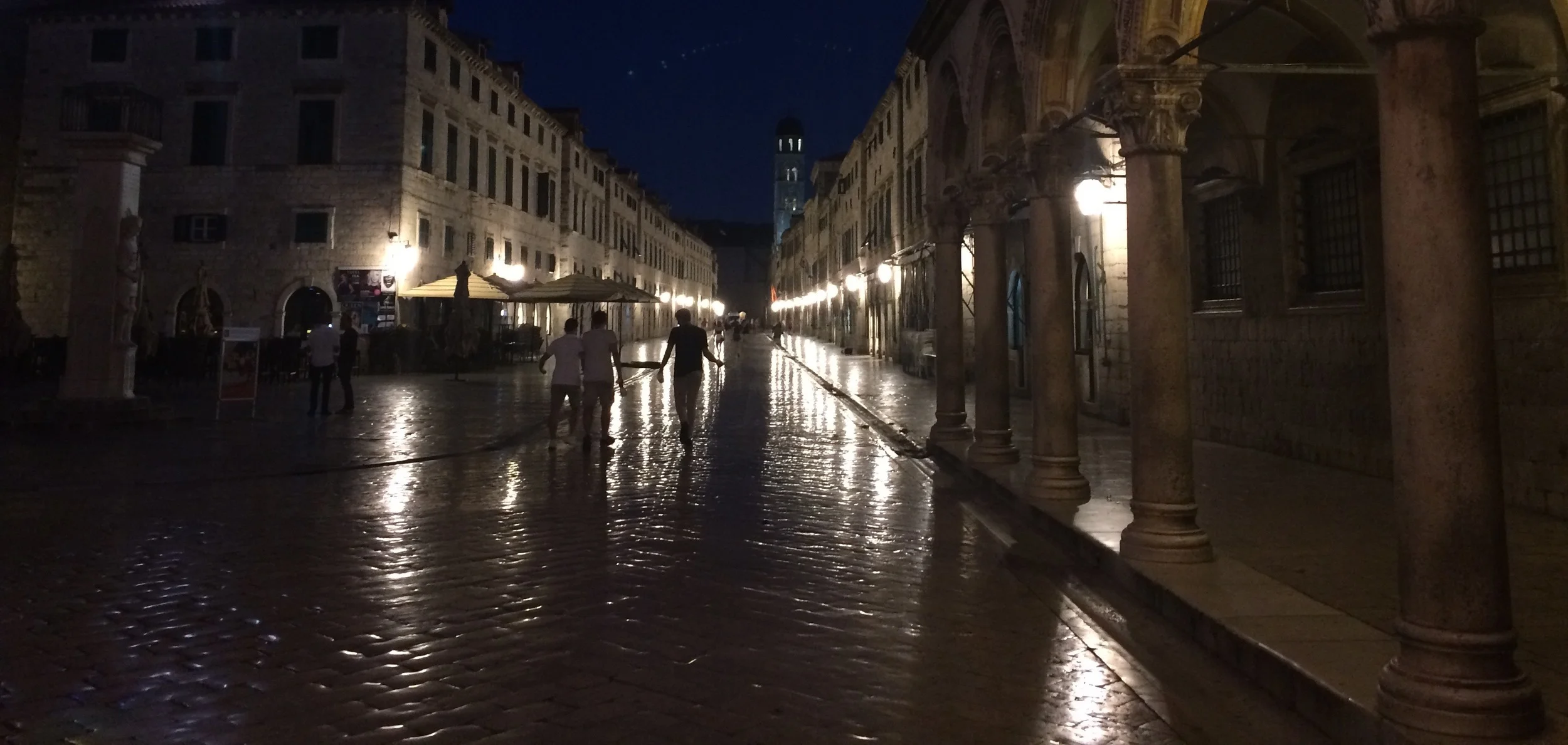 Dubrovnik's main street, Stradun, at 5:00 AM when all is quiet. The surface is not wet, it is highly polished from centuries of foot travel. 