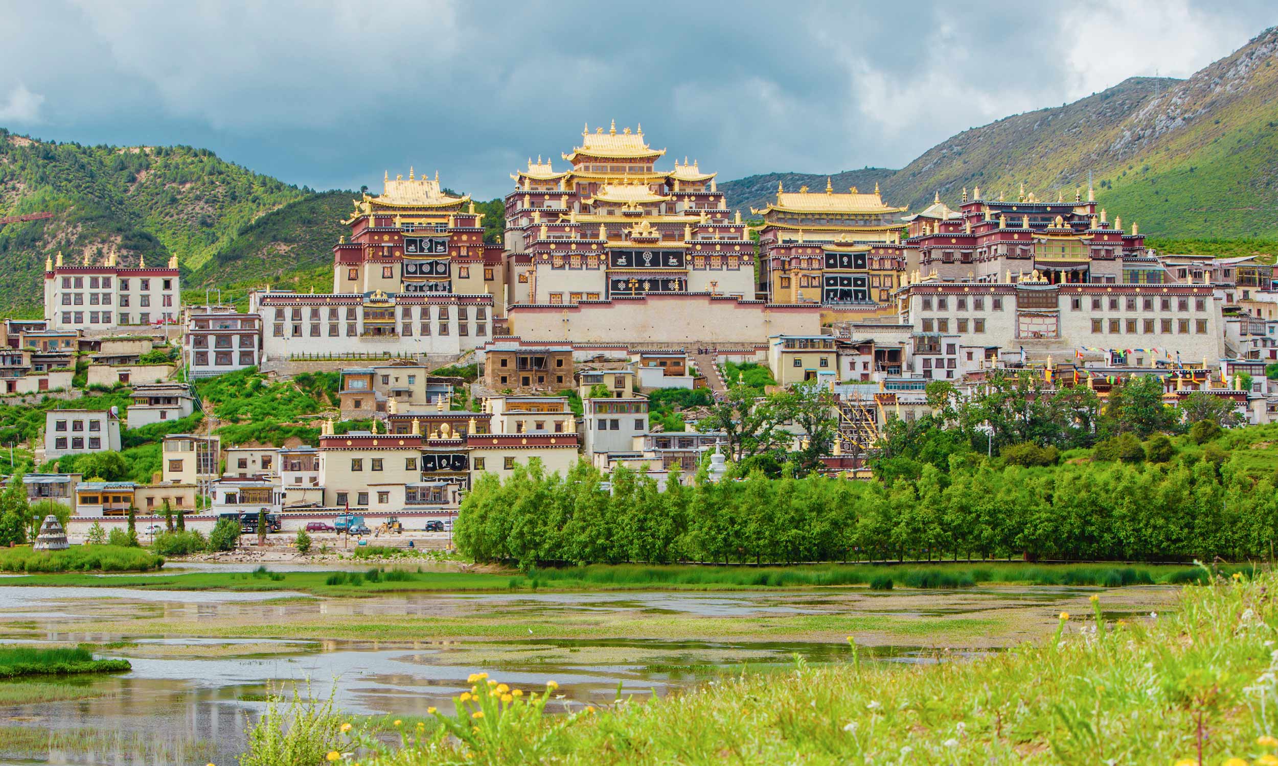   The Ganden Sumtseling Monastery towers over the village in Shangri-La.  