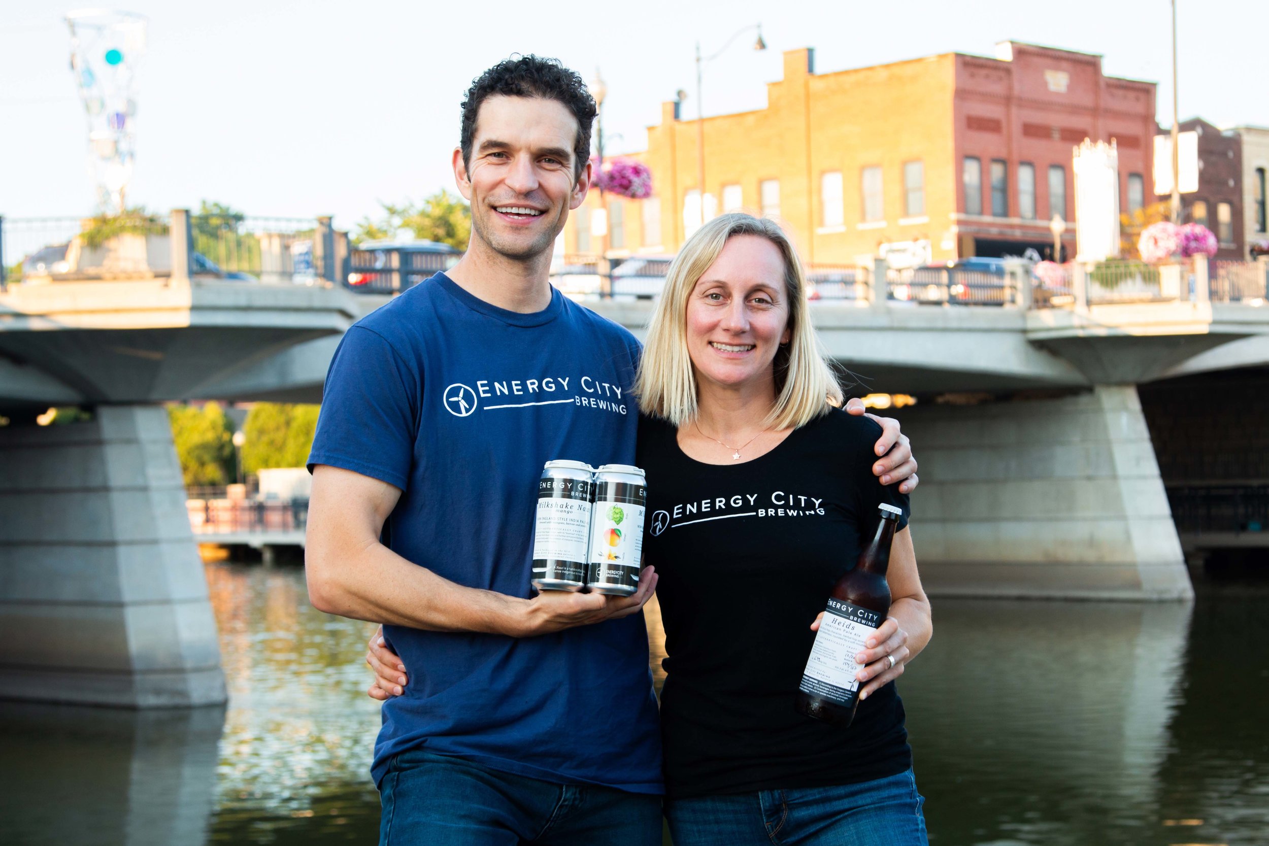   Energy City Brewing founders, David & Heidi Files stand beside Batavia's Fox River  