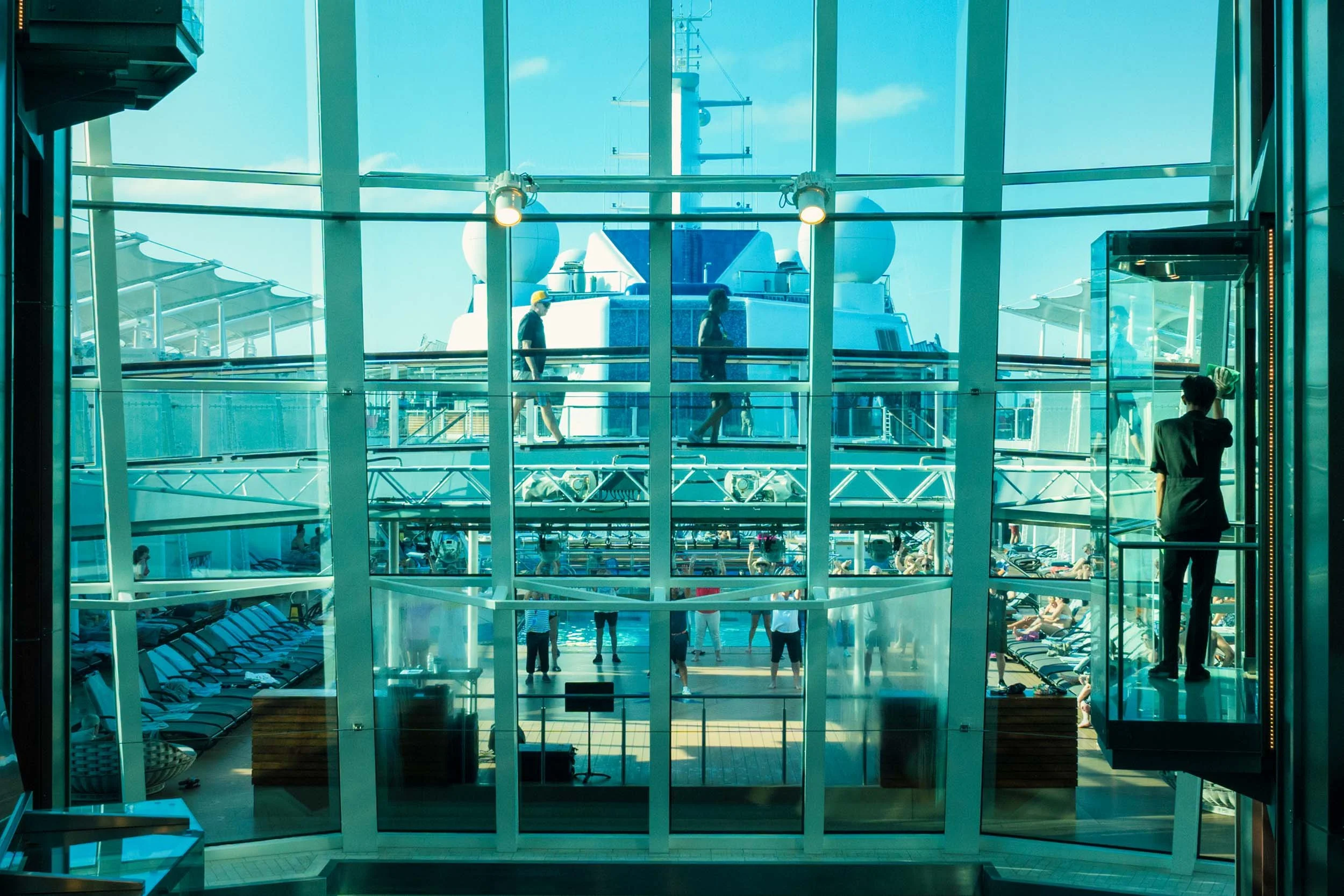 Silhouette of a passenger in the ship's glass atrium, Alaska cruise
