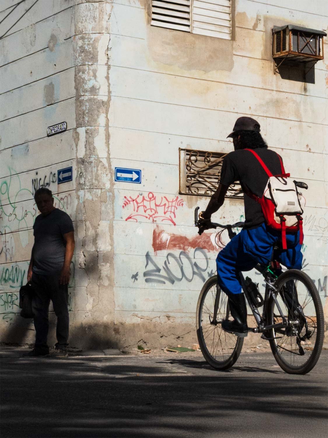 urban street photography cyclist graffiti city corner Latin America documentary street style editorial