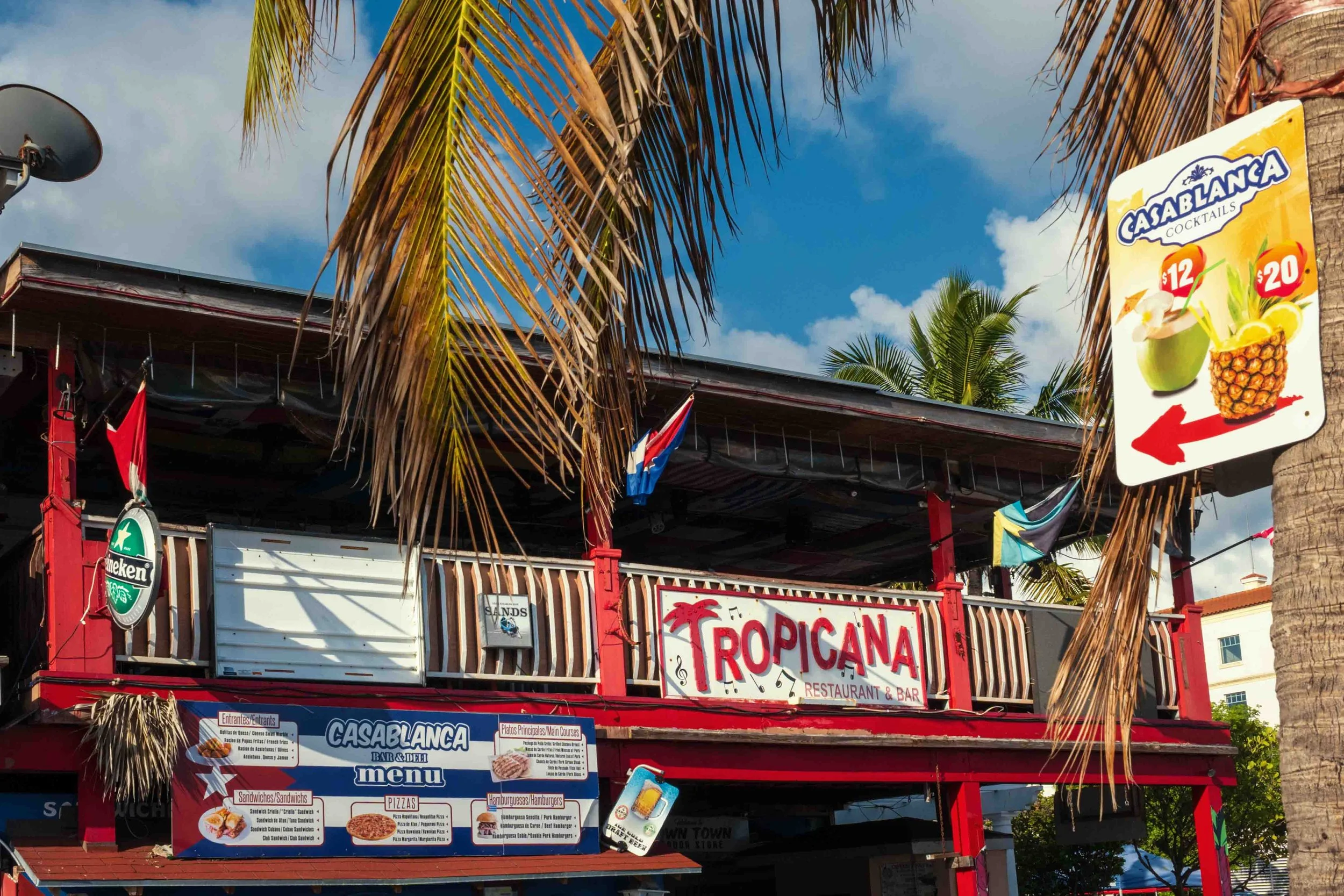 Tropicana Restaurant Bar Caribbean dining Casablanca cocktails tropical destination food menu outdoor signage