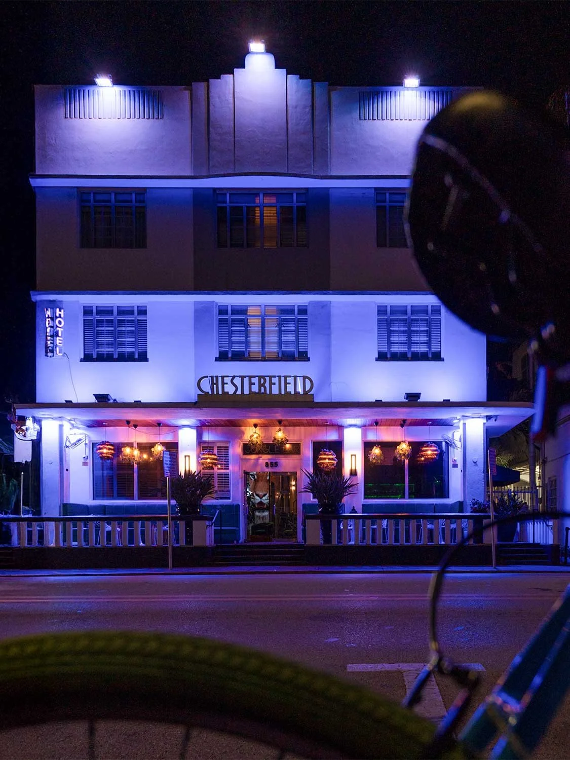 Chesterfield Hotel Miami Beach Art Deco architecture nighttime exterior blue purple neon lighting boutique hotel