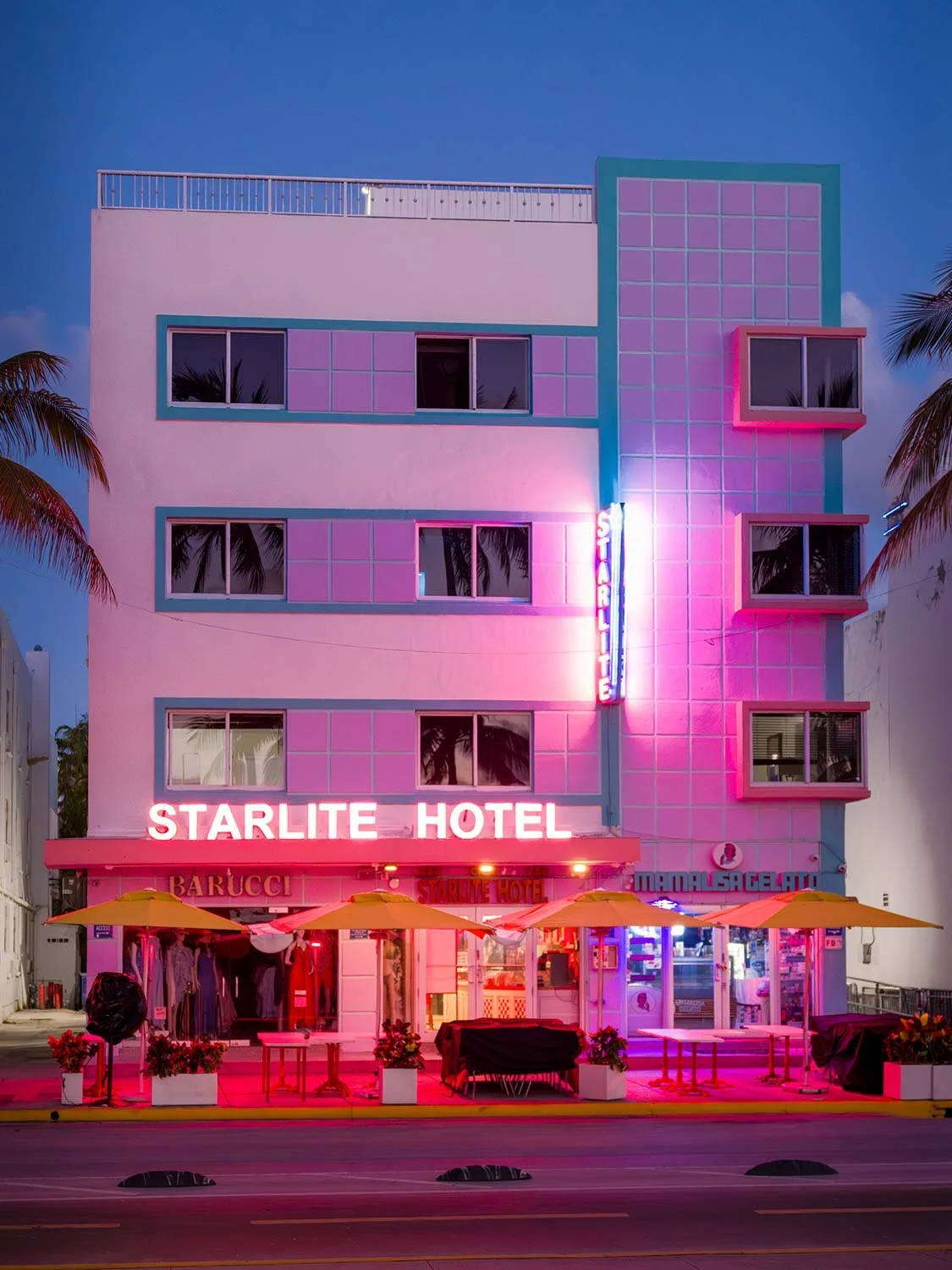 Art Deco hotel Miami Beach neon sign night photography Ocean Drive South Beach boutique hotel exterior.