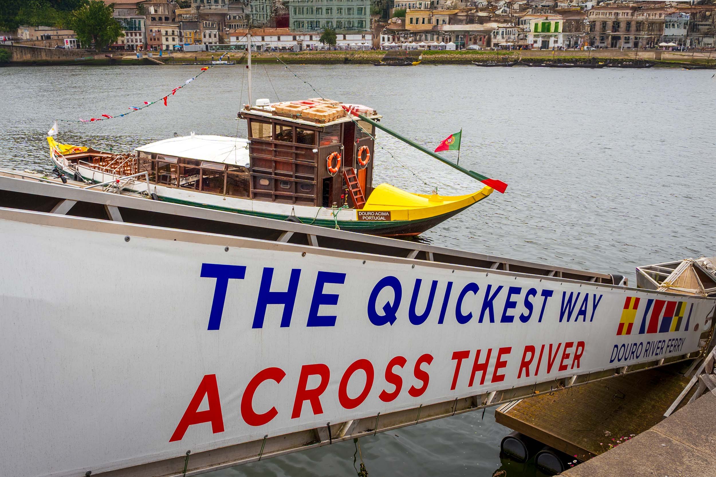 Traditional rabelo boat docked on the Douro River in Porto