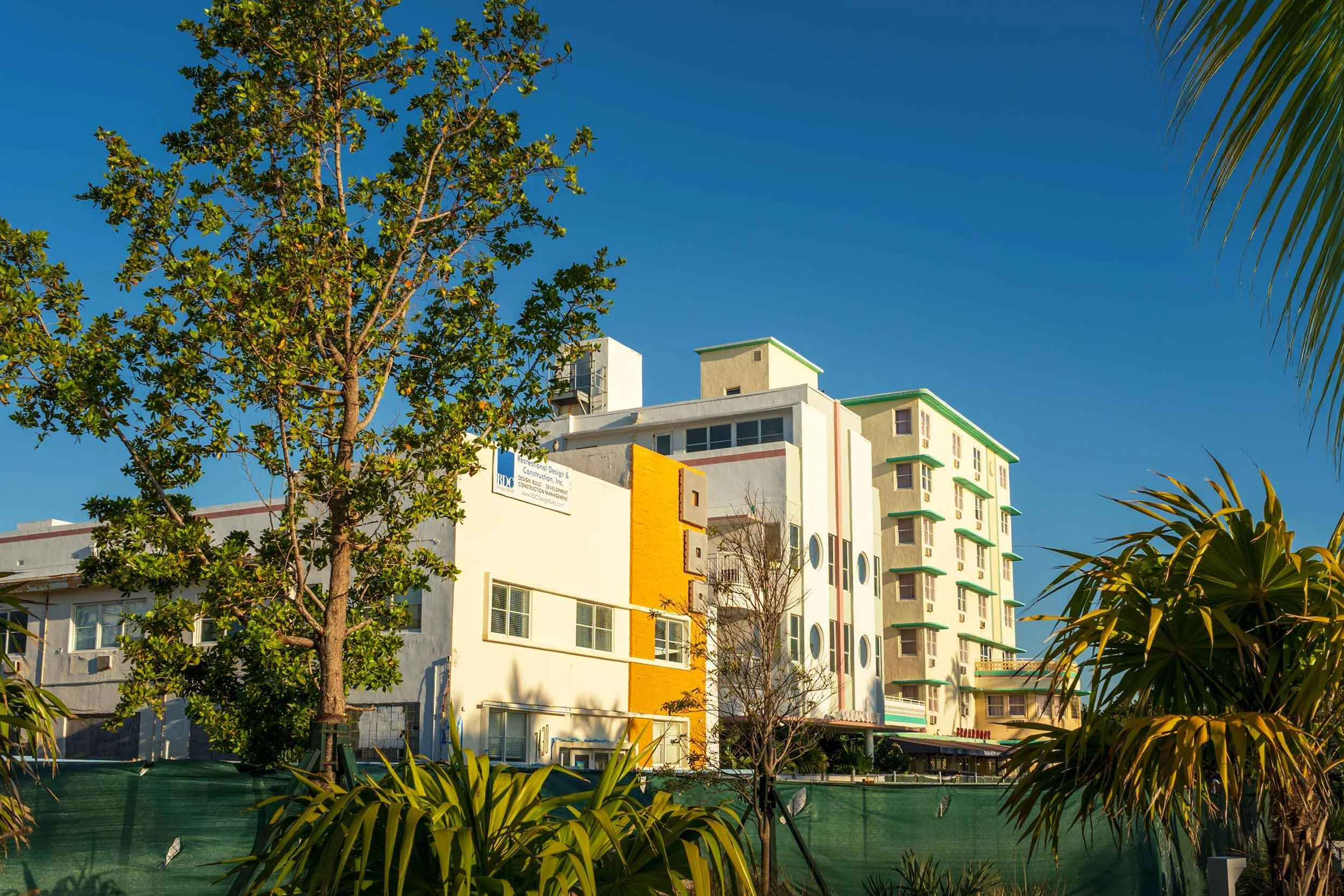 Street view down the Ocean Terrace block toward the Broadmoor at 7450, with Ocean Way Hotel and the Ocean Surf visible in the foreground