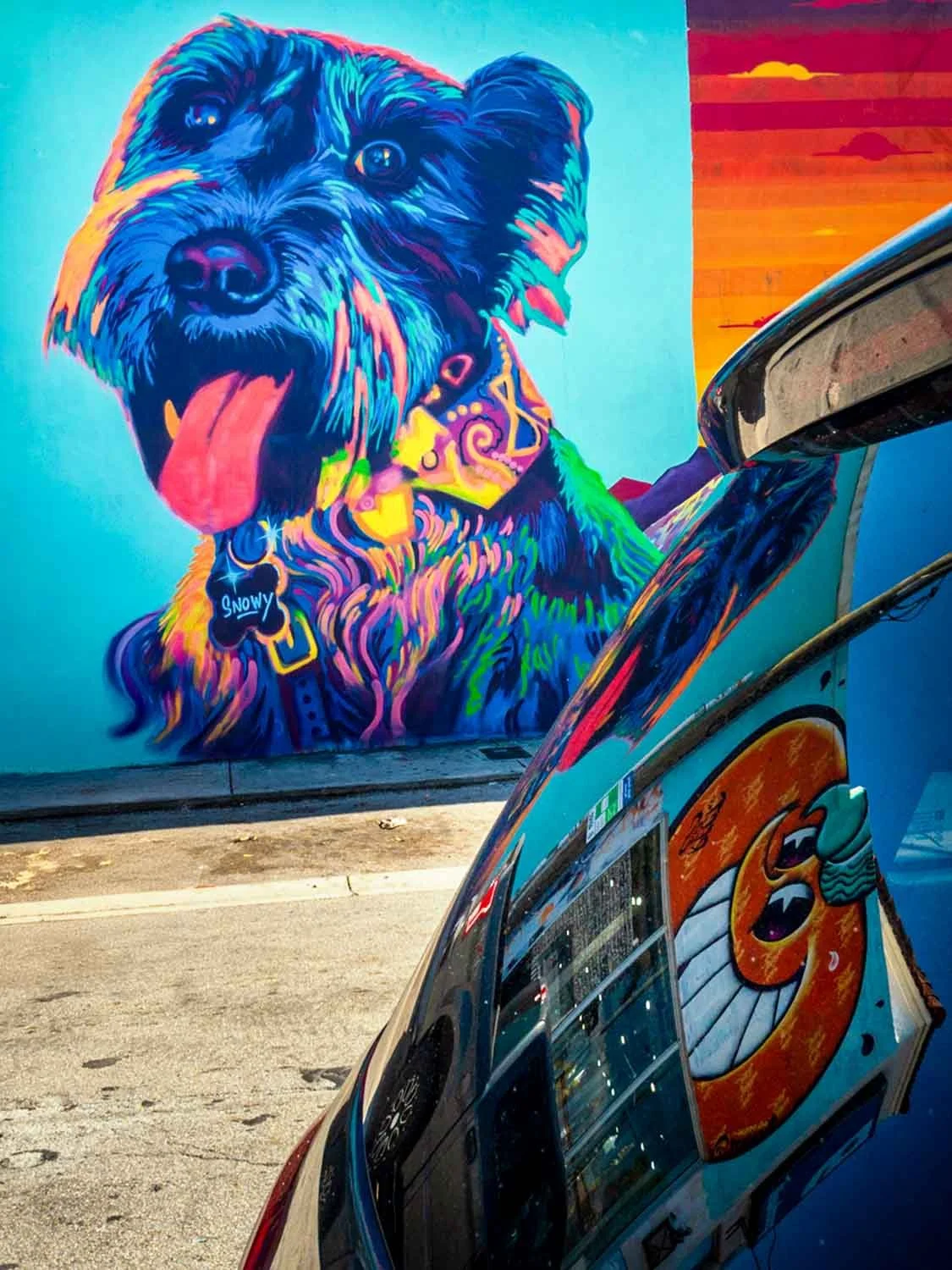 Large dog mural on an exterior wall in the Wynwood arts district, Miami