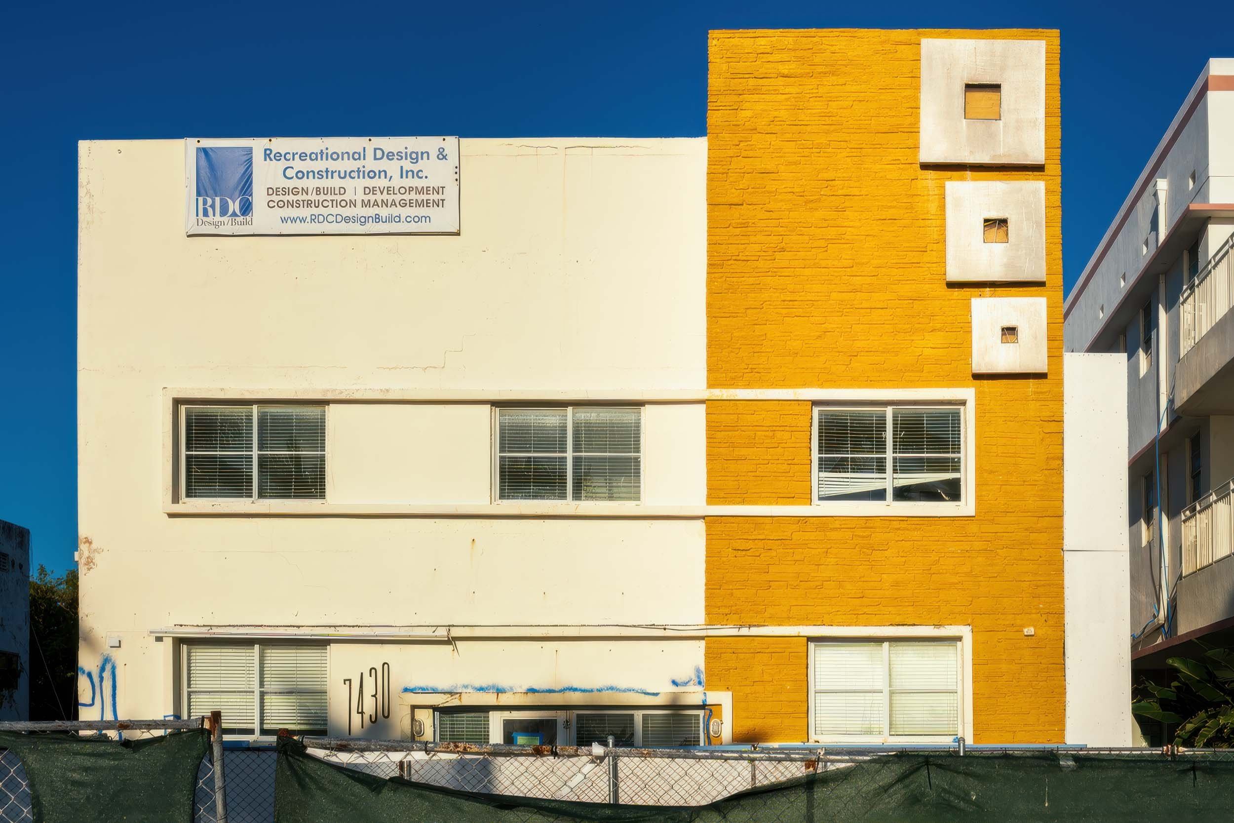 Hawaii Hotel at 7430 Ocean Terrace with white stucco and yellow brick facade, North Beach Miami