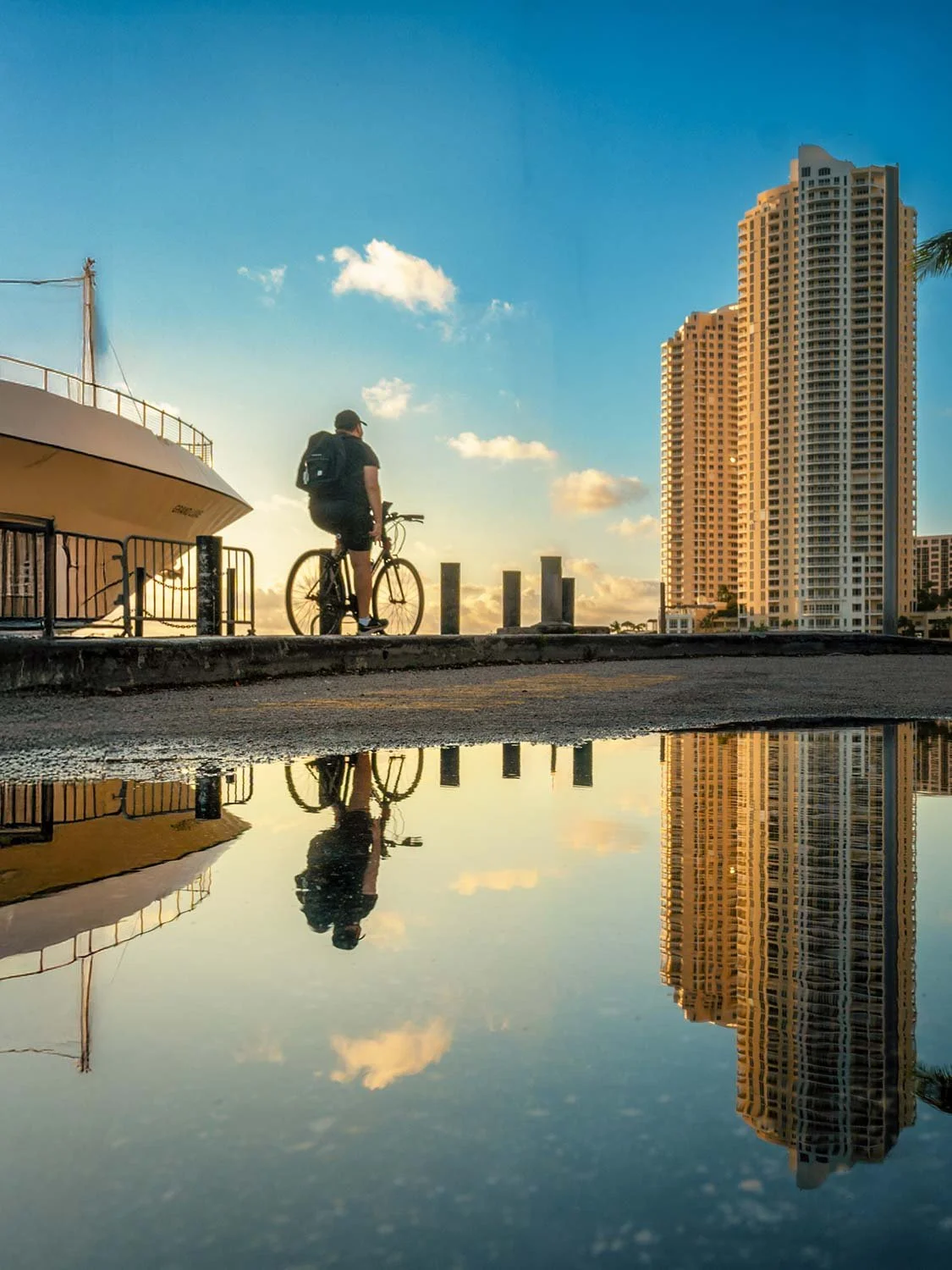 Bike rider on the Miami Riverwalk in downtown Miami