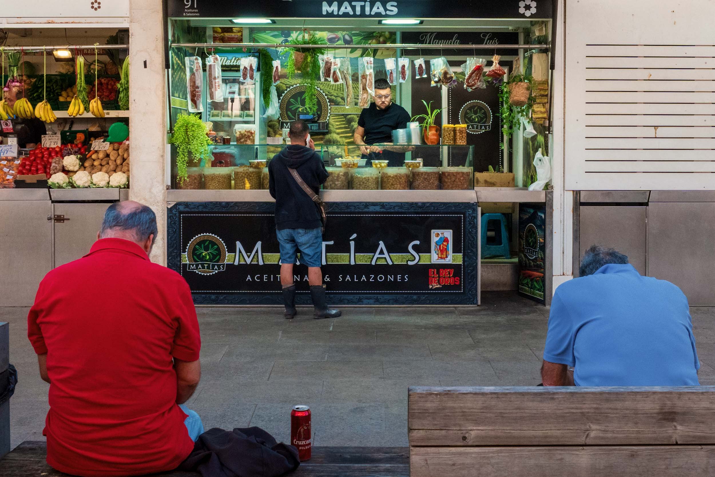 Matías aceitunas salazones stall Cadiz Spain market fresh olives cured meats traditional Spanish food vendor.