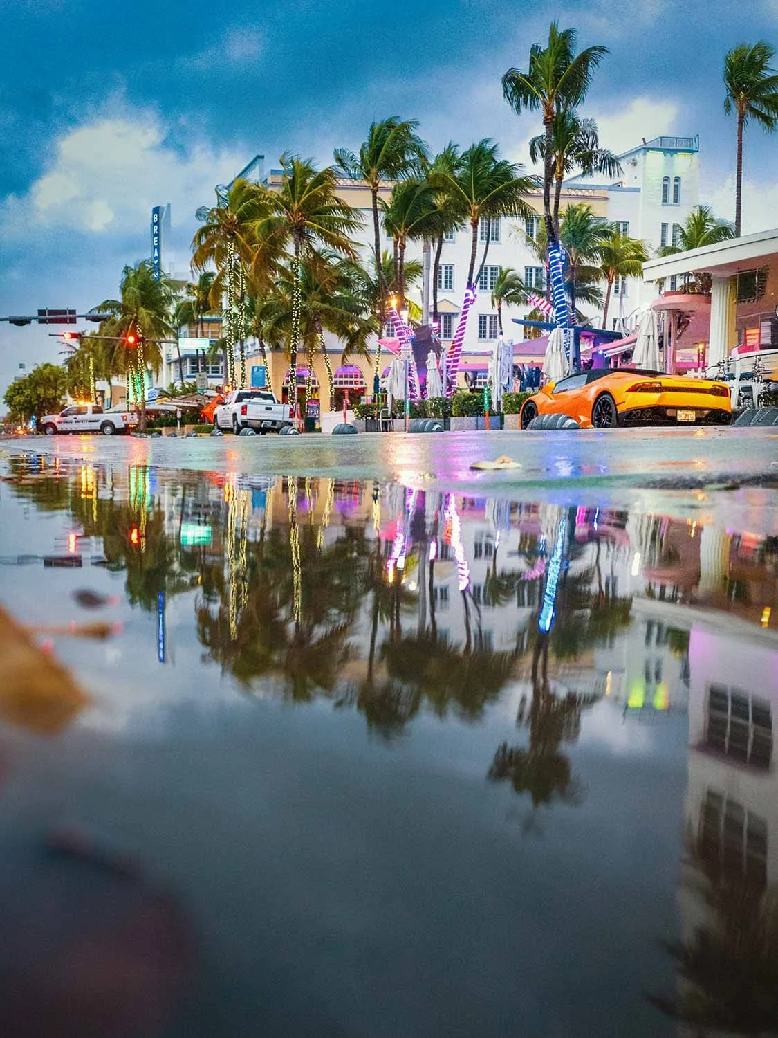 Miami Beach photographer - water reflection in front of the Art Deco hotels on Ocean Drive in South Beach Miami