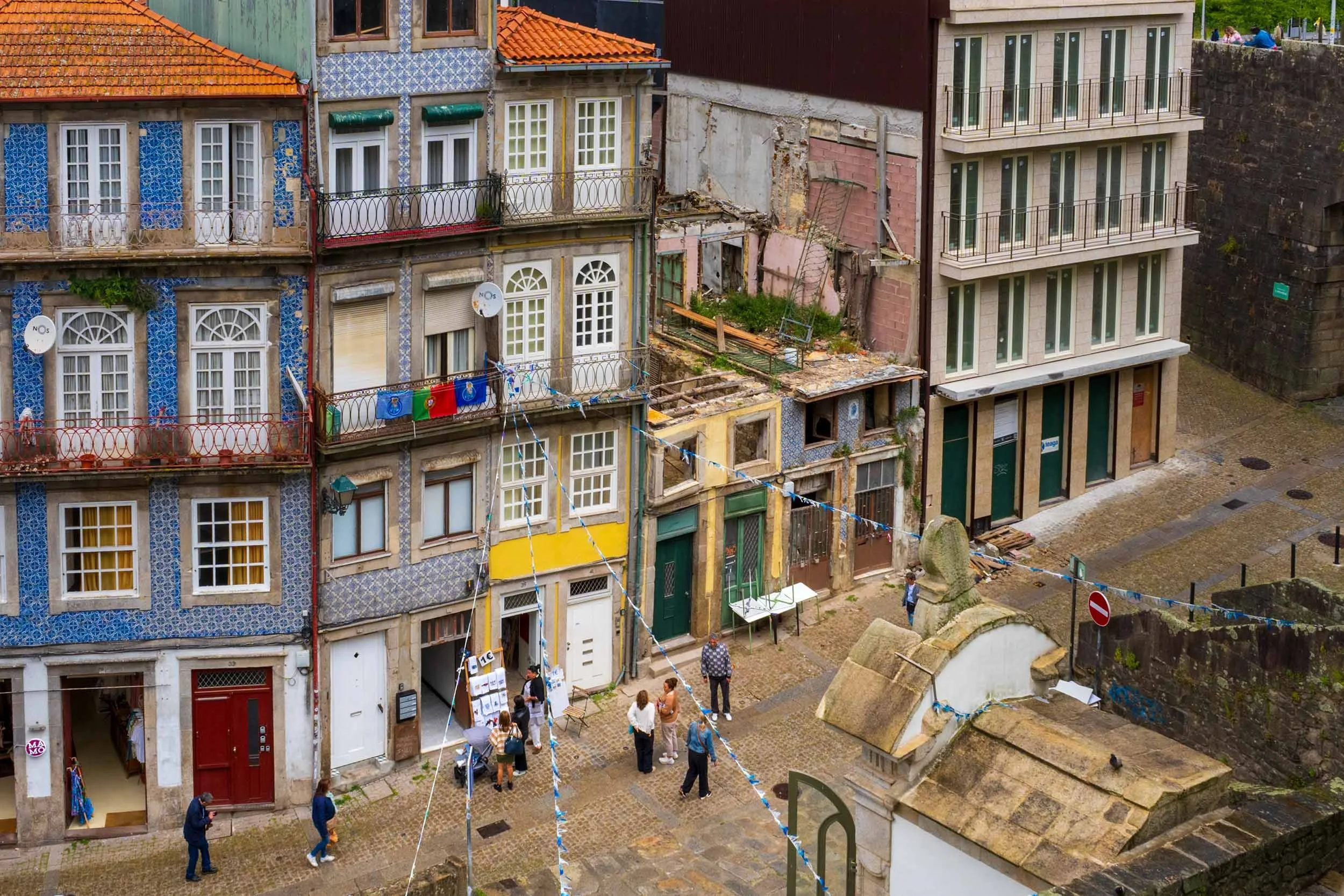 Old town architecture around a cobblestone square in Ribeira, Porto