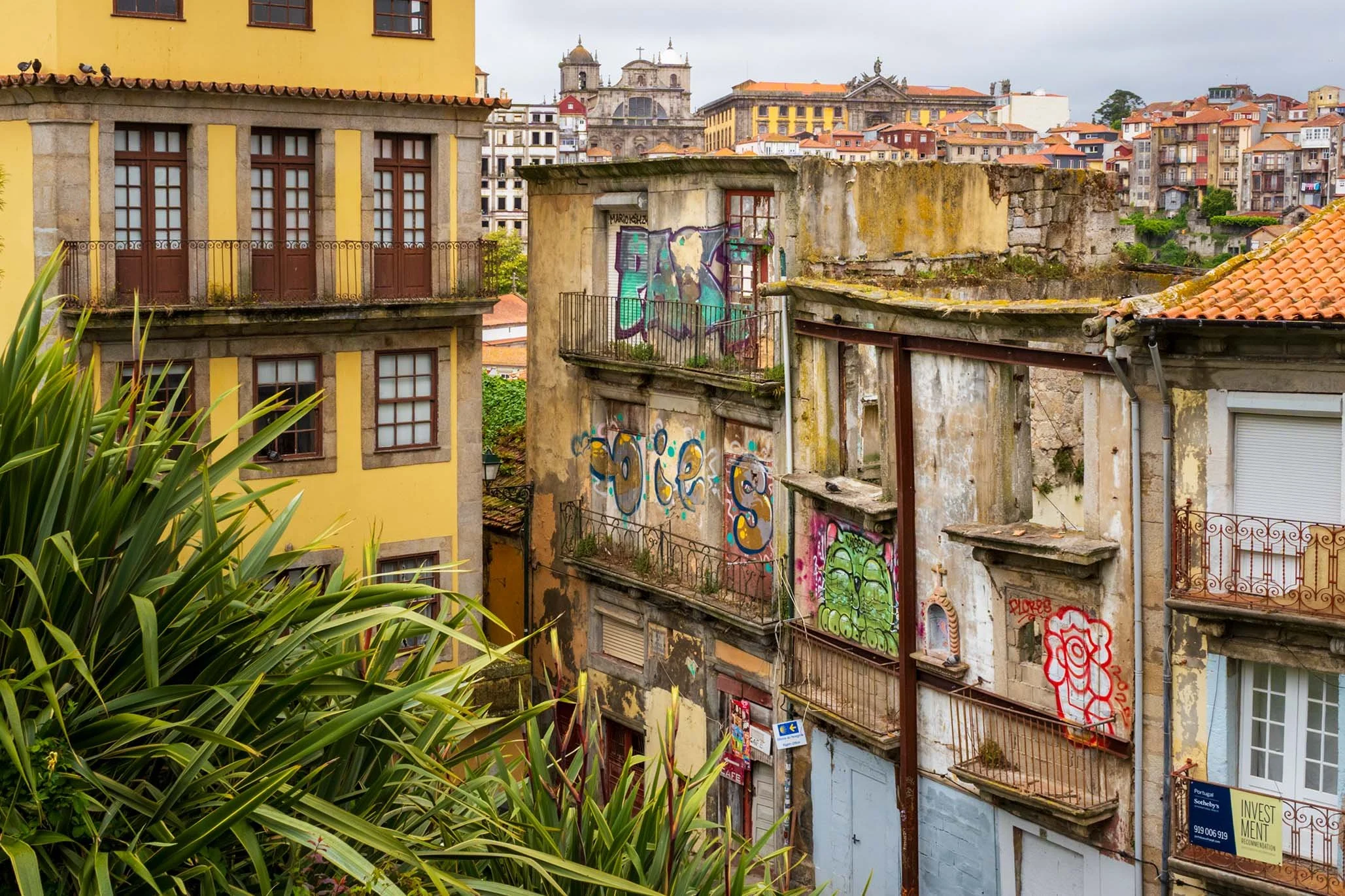 Weathered buildings in Porto's historic Ribeira district cityscape