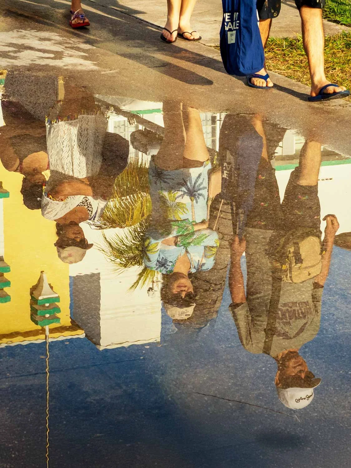 South Beach puddle reflection photography street art tourists Miami travel candid urban art district