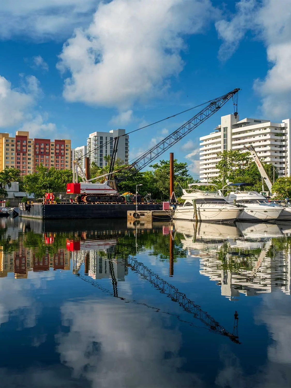 Miami River marine construction crane barge waterfront development urban infrastructure Florida