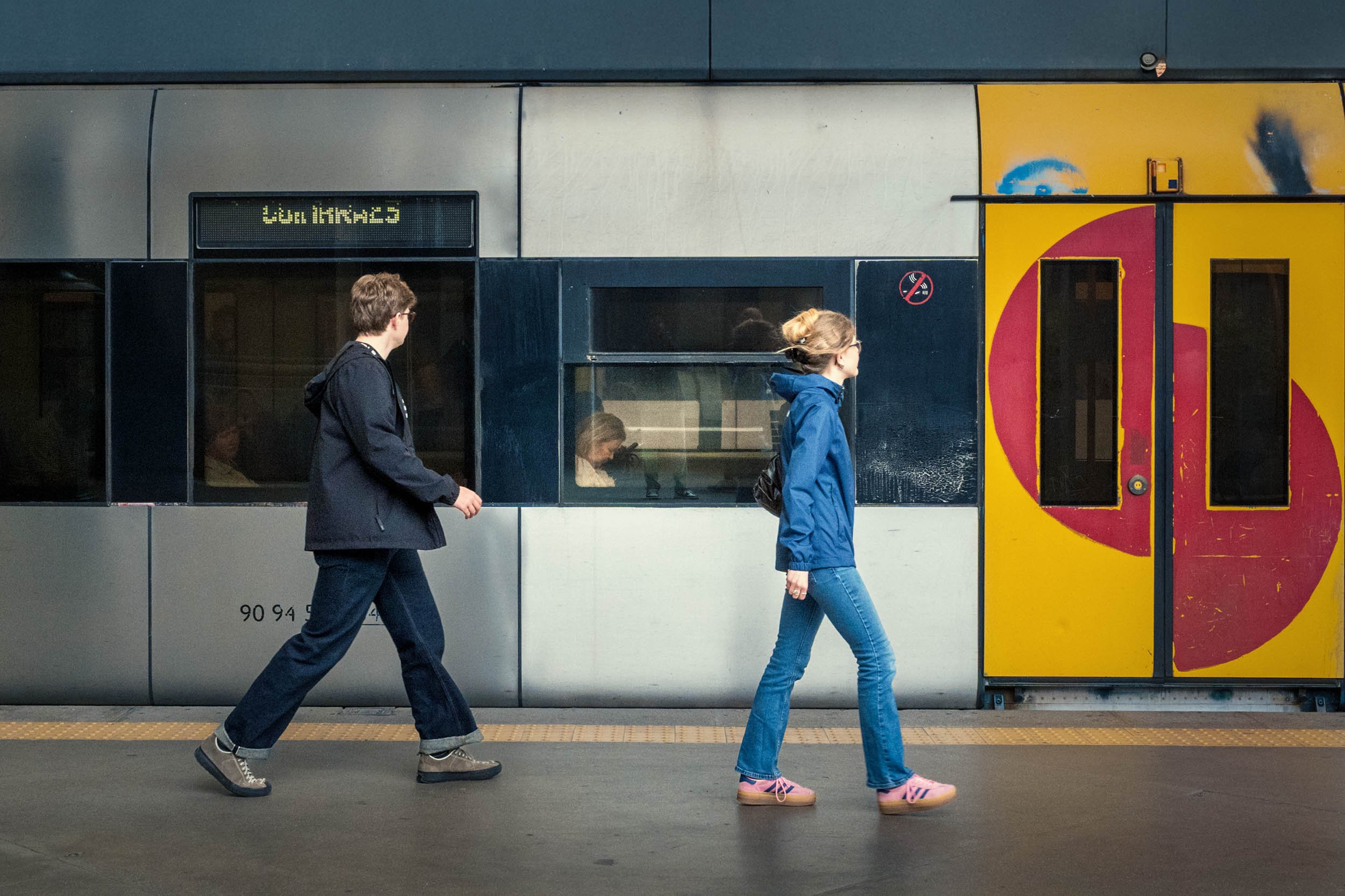 Passengers on the platform at a Porto metro station