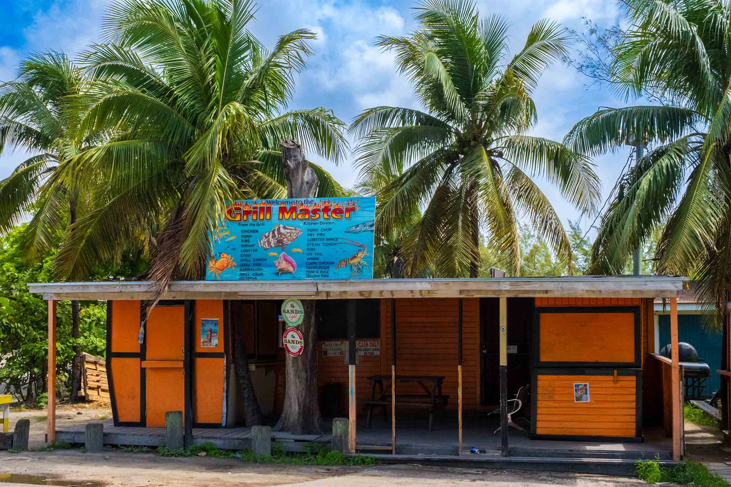 Grill Master seafood restaurant sign, lobster and conch menu, Nassau Bahamas