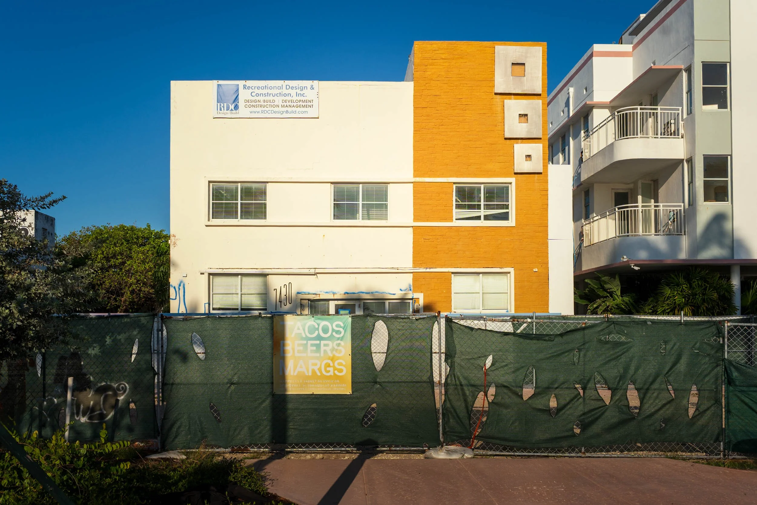 7430 Ocean Terrace address numbers on the orange-brick Ocean Way Hotel facade, North Beach Miami