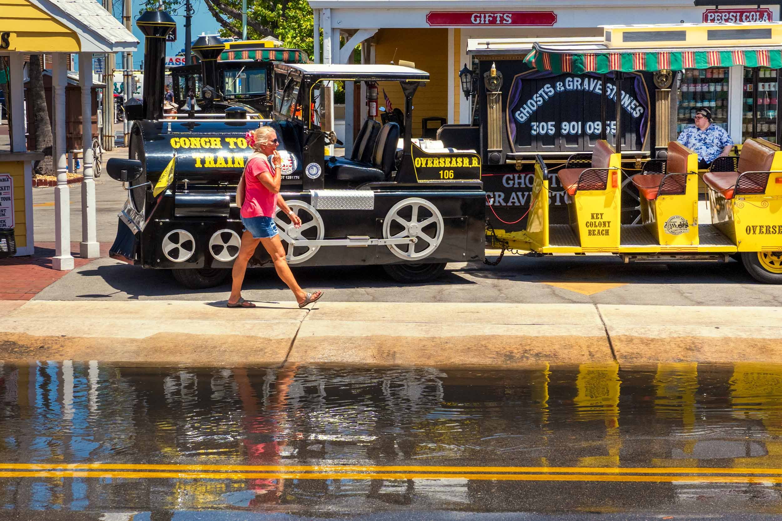 Key West Conch Tour Train sightseeing attraction with Ghosts Gravestones tour vehicle downtown Key West Florida