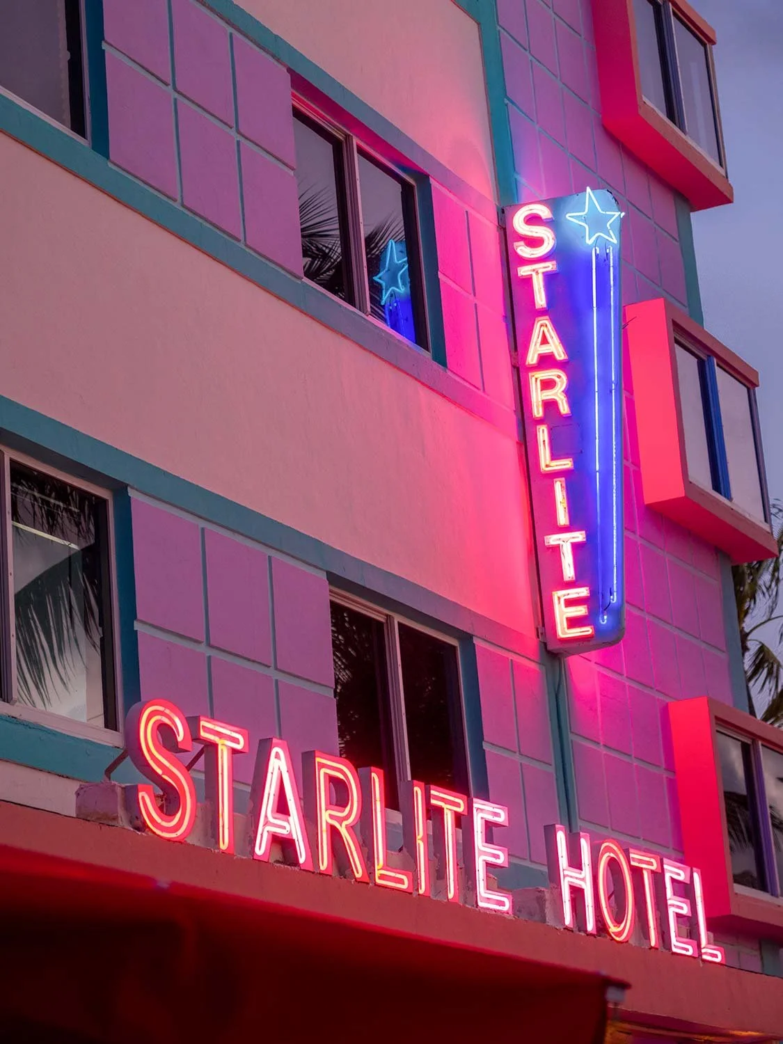 Starlite Hotel Miami Beach neon sign Art Deco architecture pink blue retro lights South Beach hotel.
