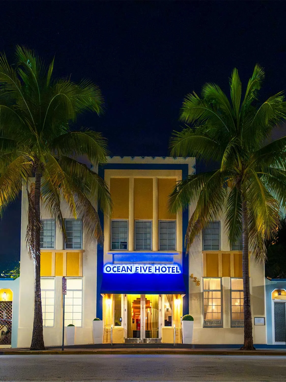 Ocean Five Hotel Miami Beach Art Deco boutique hotel exterior night photography neon sign palm trees