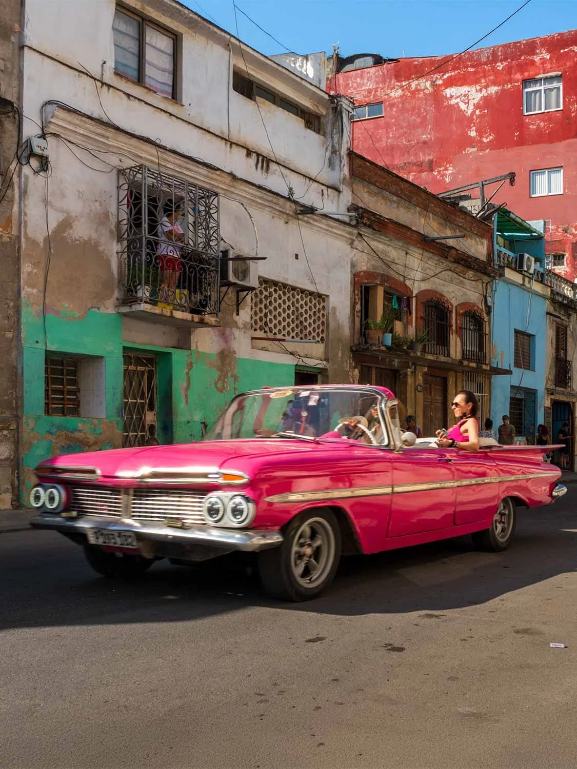 Vintage pink classic car Havana Cuba street tour | retro American convertible Old Havana travel photography