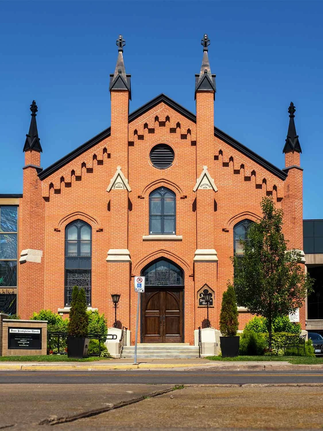 Knox Presbyterian Church historic Gothic architecture red brick spires arched windows heritage building exterior