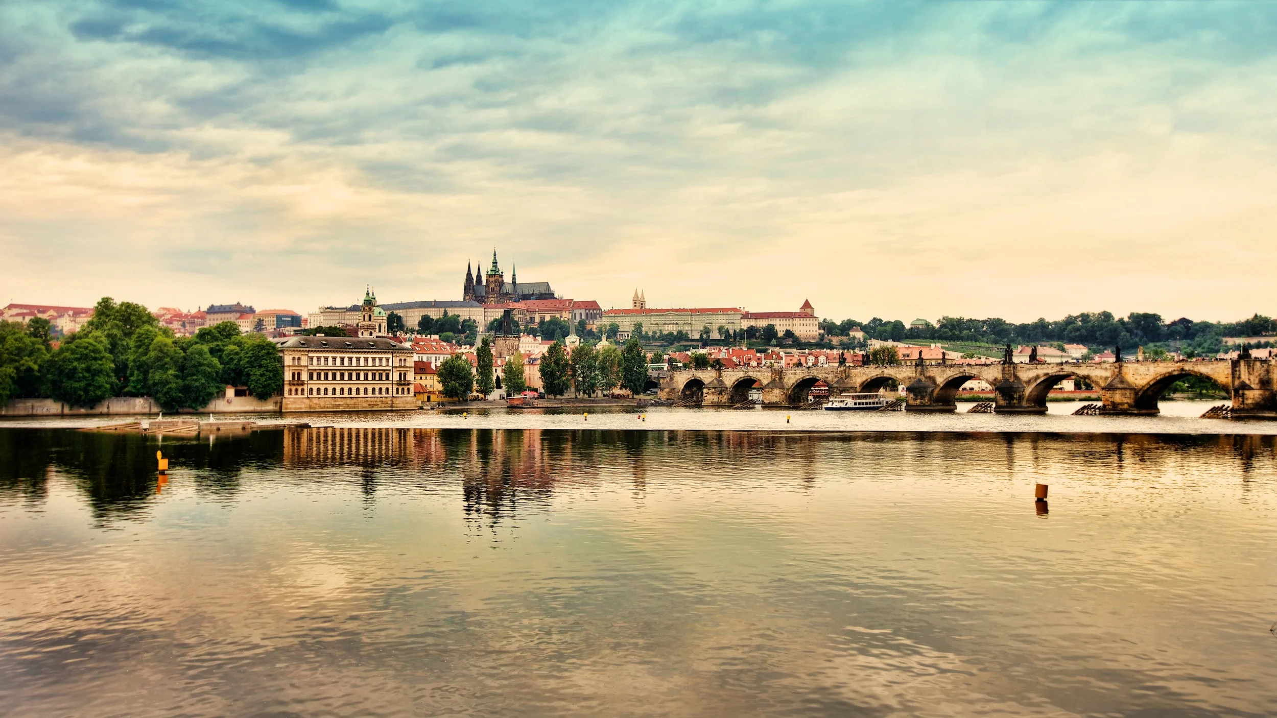 This is the view of Prague Castle from across the river Vltava with Charles Bridge in front on the right
