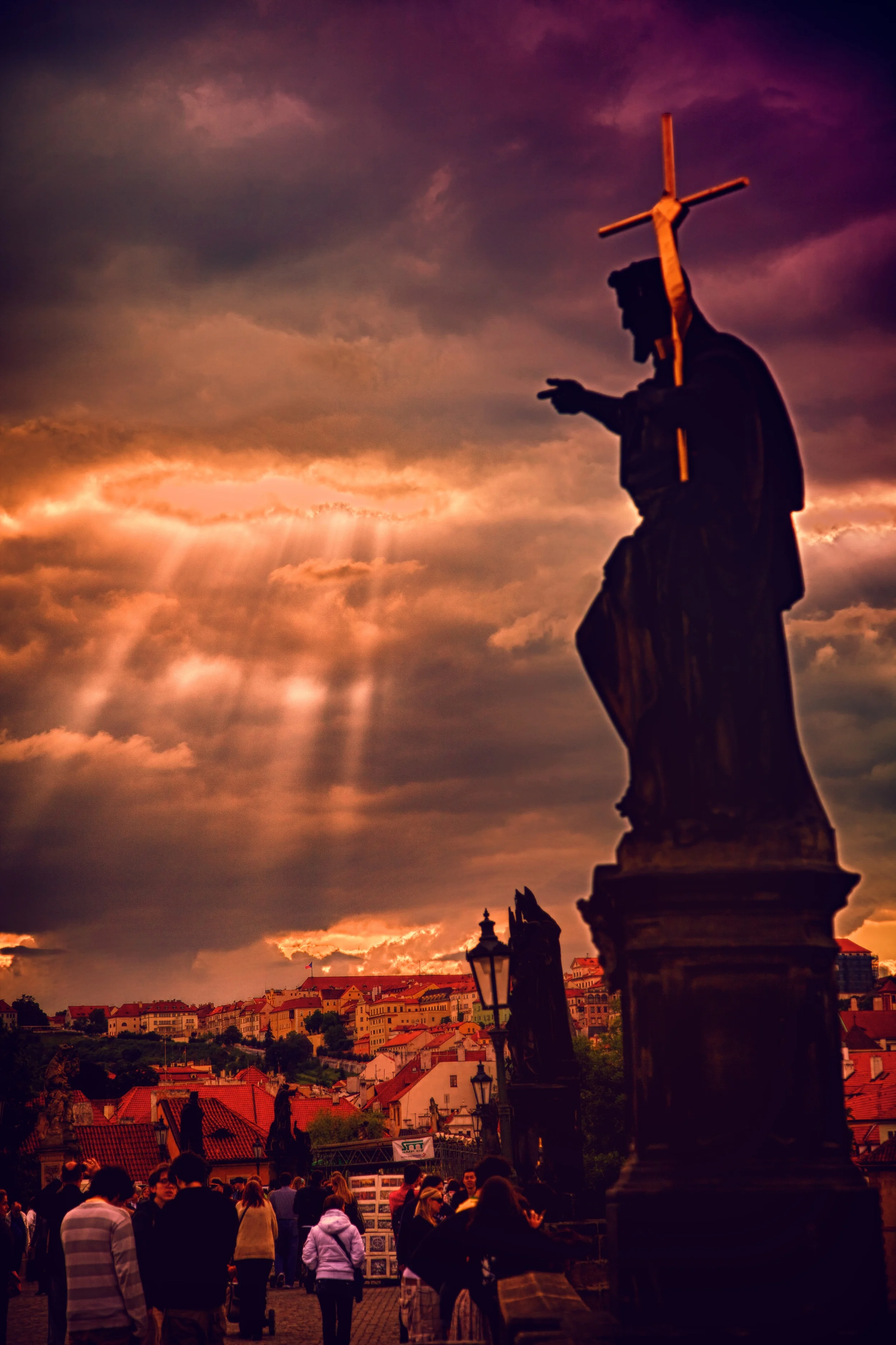 One of the most interesting places in the world to me is the wonderful Charles Bridge in Prague. Gorgeous, ethereal, a place where time almost stopped.
Here is a shot from one evening when the sun and clouds were particularly cooperative.