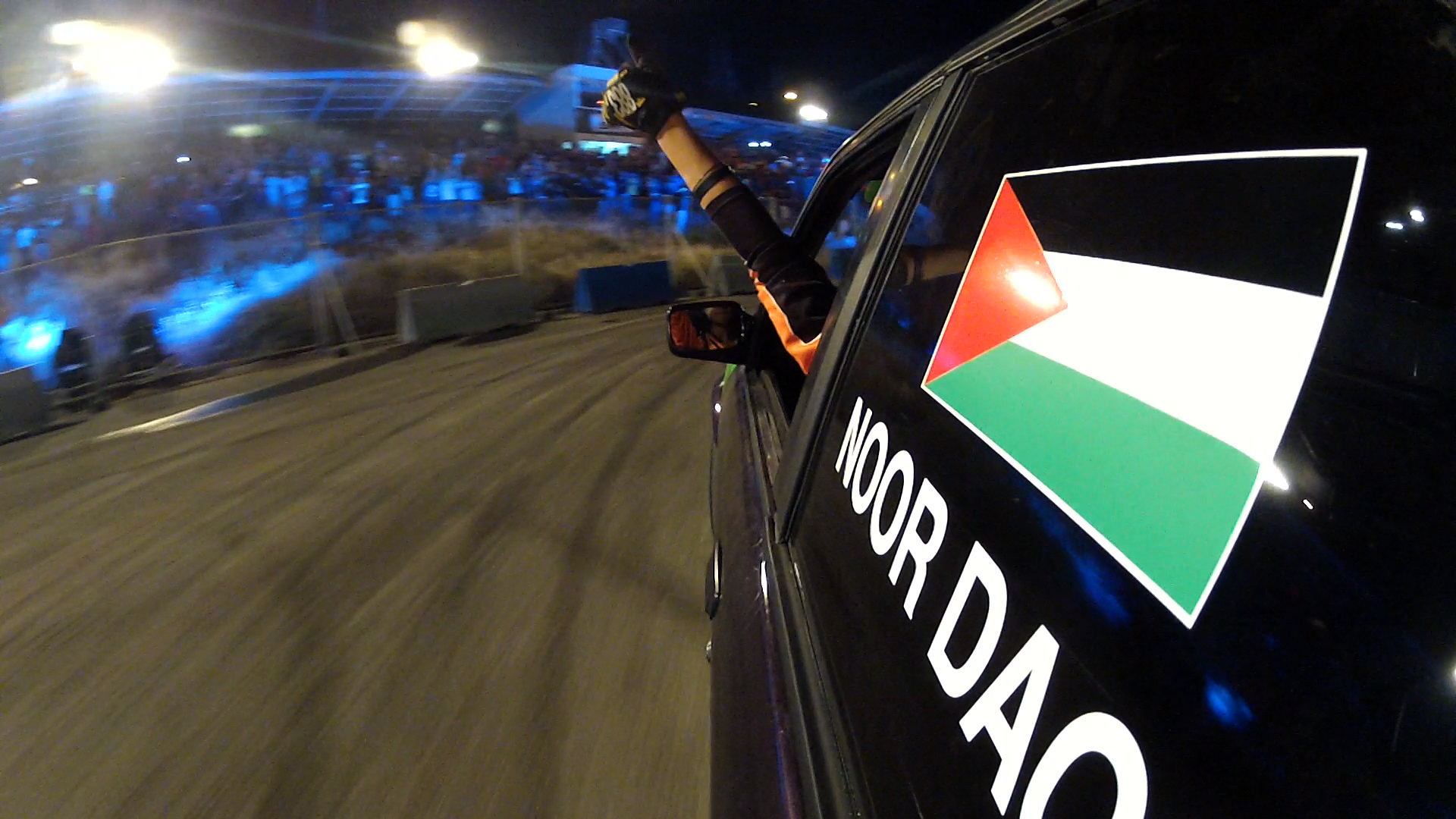 05 Noor gives a thumbs up as she completes a drift course in Jordan - Credit Amber Fares.png