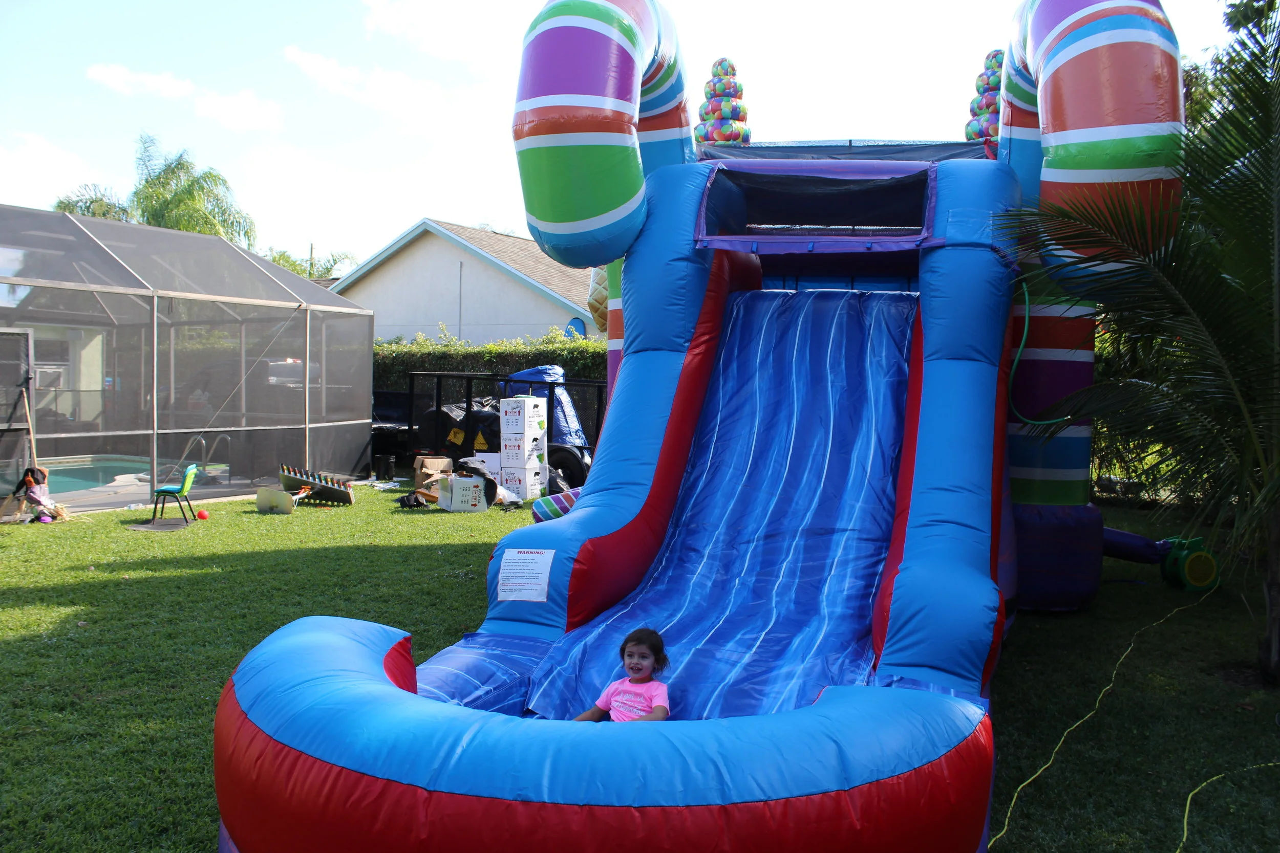 sugarshack-candylandthemedunit-bouncehouse-waterslide-icecreamsocial-photobooth-rockwall.jpg
